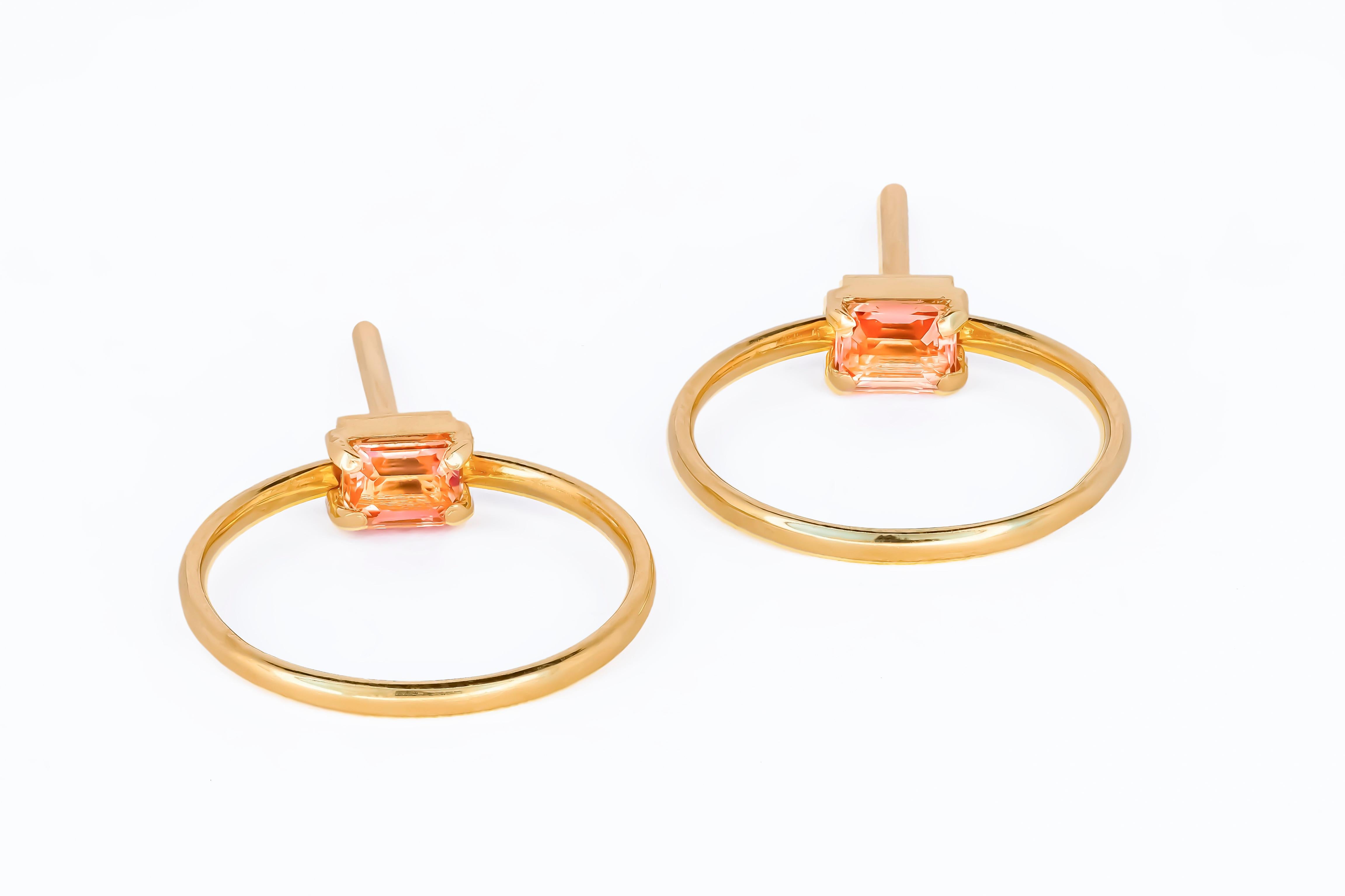 14 karat gold earrings studs with genuine sapphires. September birthstone.
Metal: 14 karat gold
Weight: 2.1 g.
Size: 16.5 x 16.5 mm.
Set with genuine sapphires: weight - 0.20 ct x 2 = 0.40 ct total.
Peach-pink color, baguette cut, clarity good -