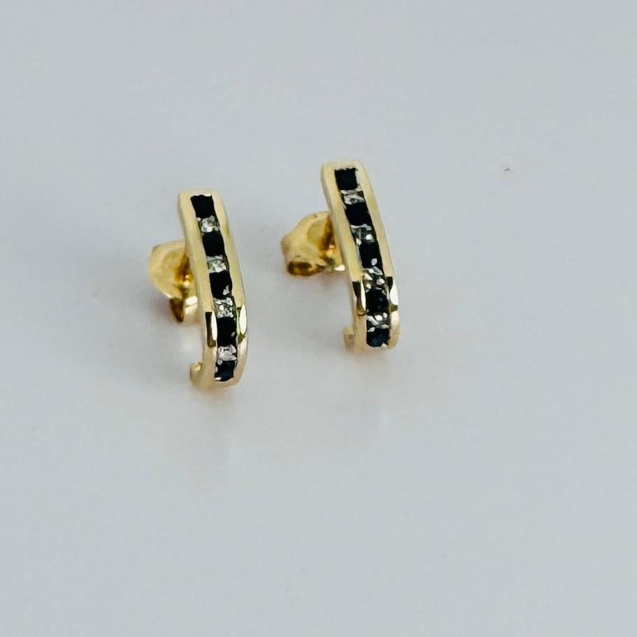 Women's 14k gold earrings with 5 blue sapphires and 5 brilliant cut diamonds For Sale