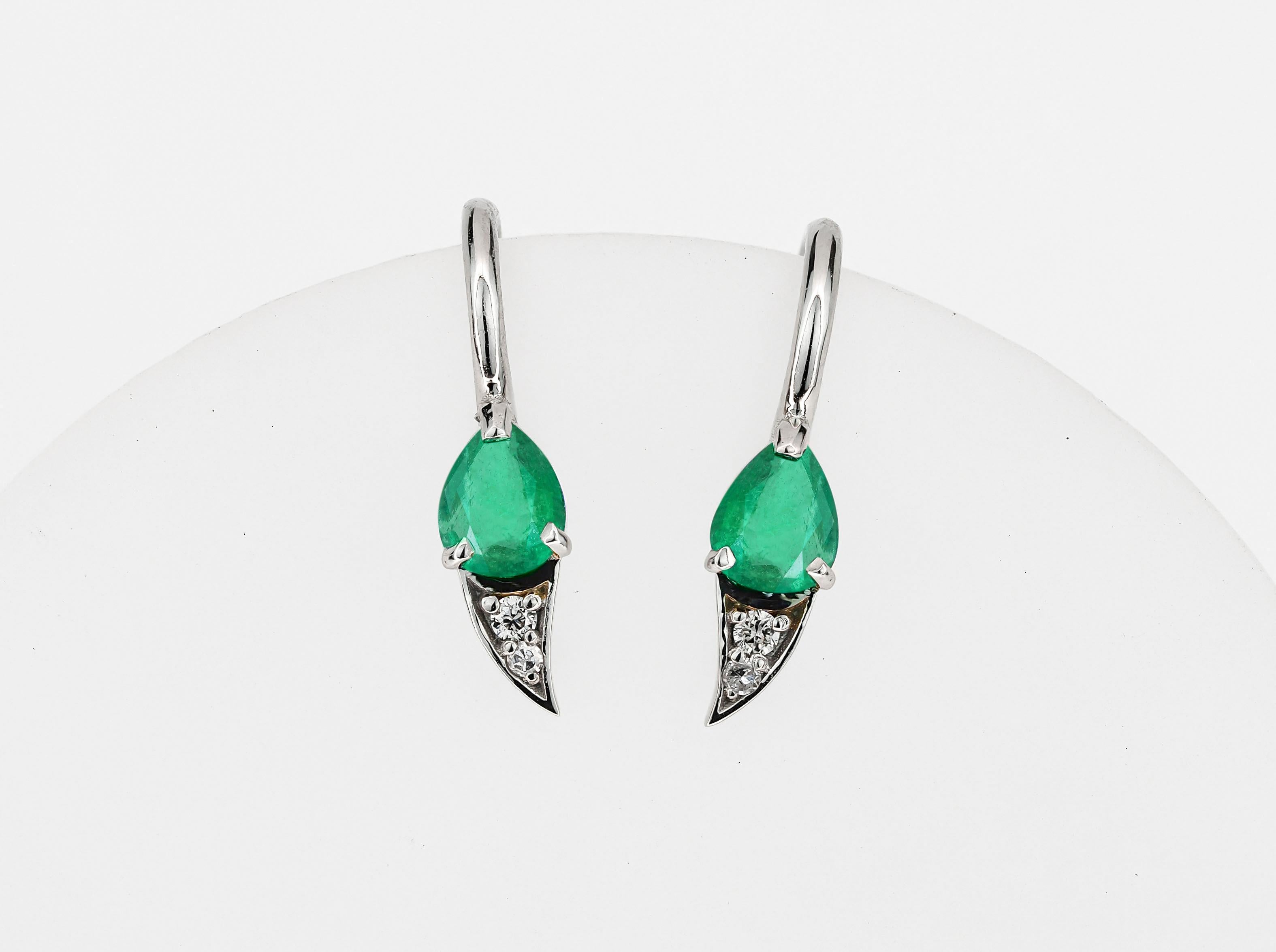 Women's 14k gold earrings with natural emerald and diamonds.  For Sale