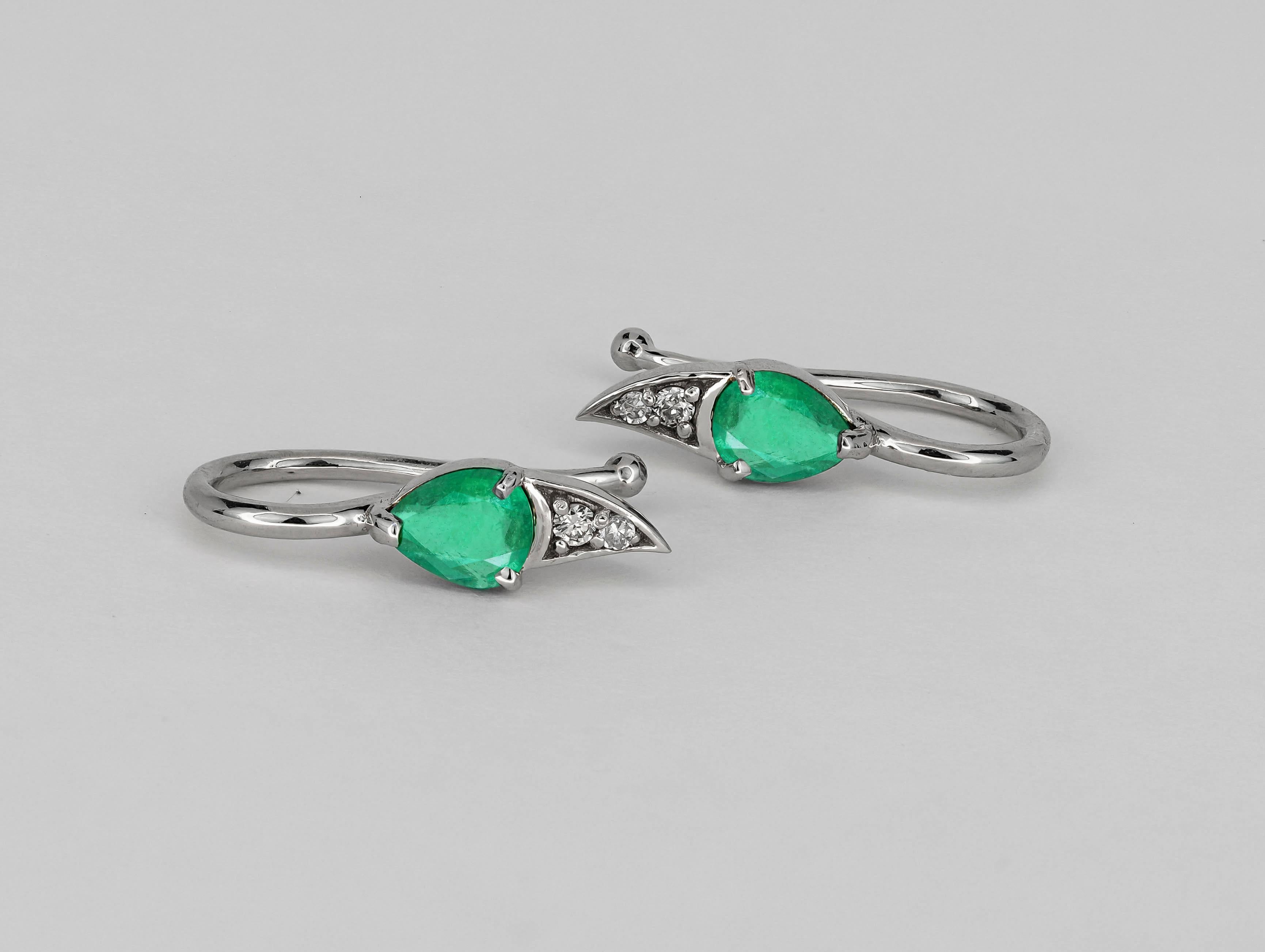 14k gold earrings with natural emerald and diamonds.  For Sale 1