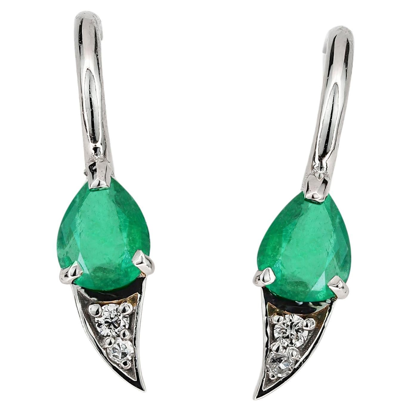 14k gold earrings with natural emerald and diamonds.  For Sale