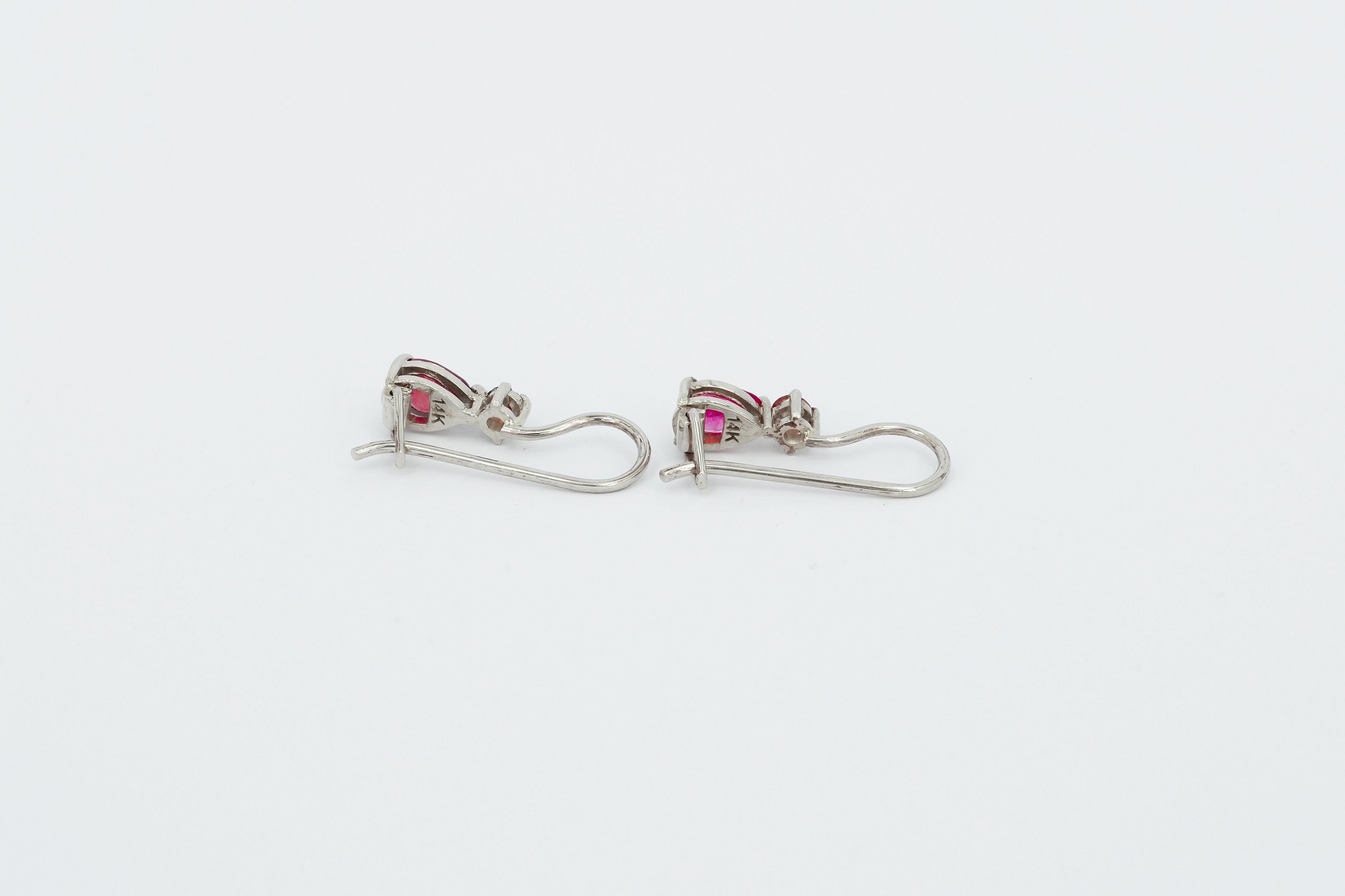 Women's 14k Gold Earrings with Pear Rubies and Sapphires For Sale