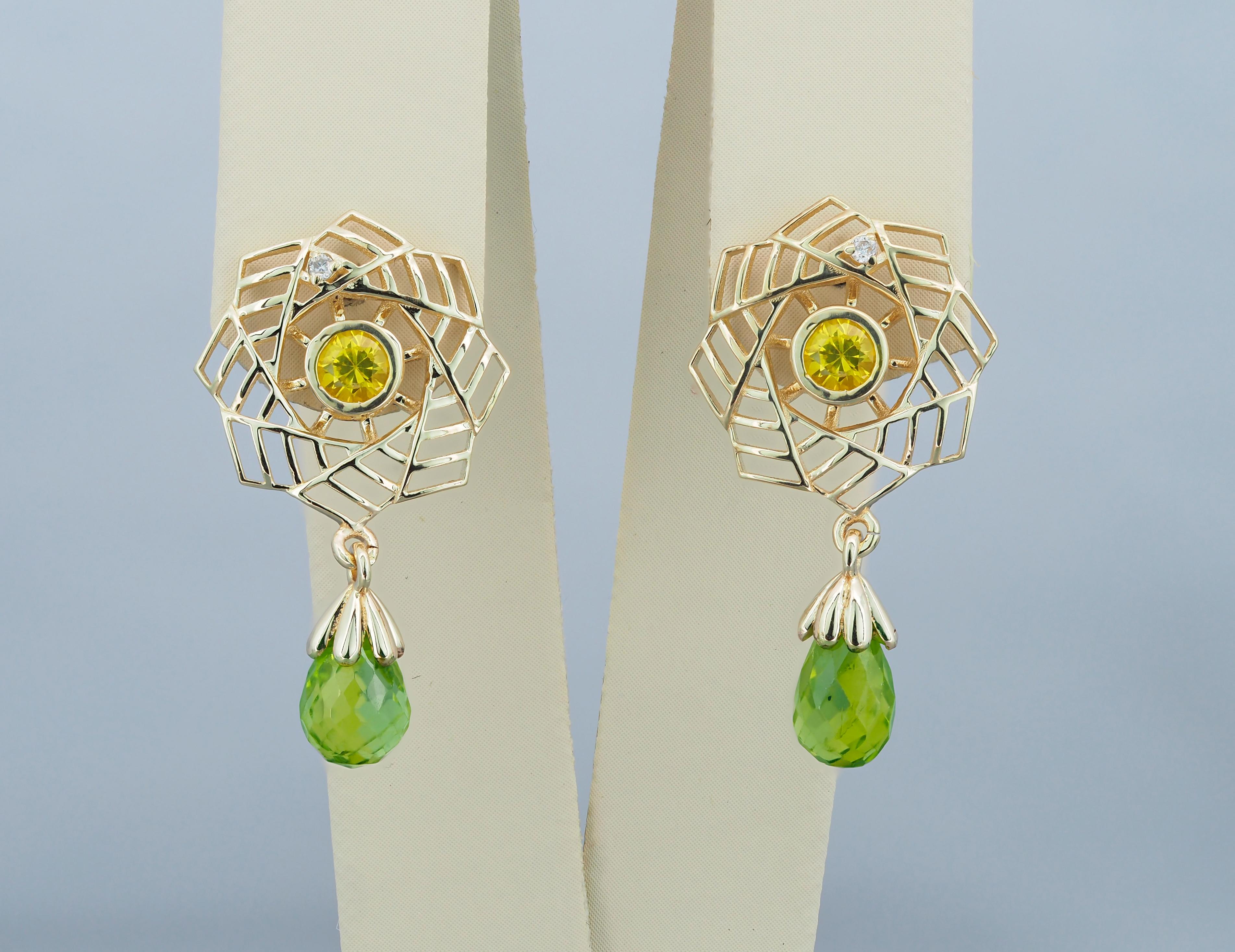 Women's 14k gold earrings with peridots, sapphires and diamonds.  For Sale