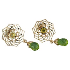 14k gold earrings with peridots, sapphires and diamonds. 