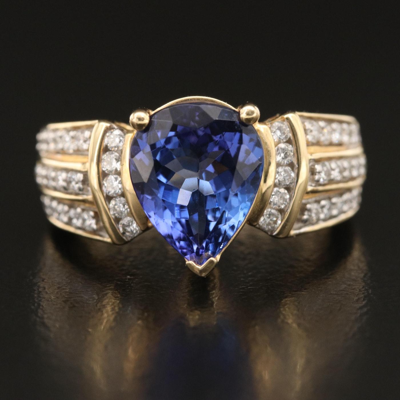 Excellent Condition 

Materials: 14K Gold
Ring Size: 7.25
Hallmarks: 14K KRN TZ3.37ct
Total Weight (grams): 8.70
  
Primary Stone(s) Type: Tanzanite
Primary Stone(s) Shape: Pear, Faceted
Primary Stone(s) Dimensions:(11.17) mm x 8.88 mm x 4.80 mm -