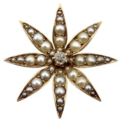 Colgante eduardiano de oro de 14 quilates de diamantes y perlas en forma de flor
