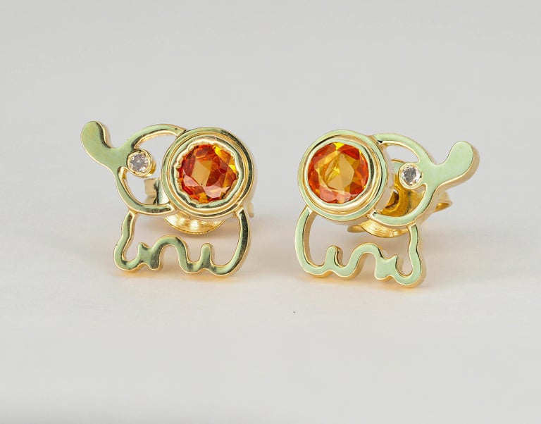 Modern 14k Gold Elephant Earrings Studs with Yellow Sapphires For Sale