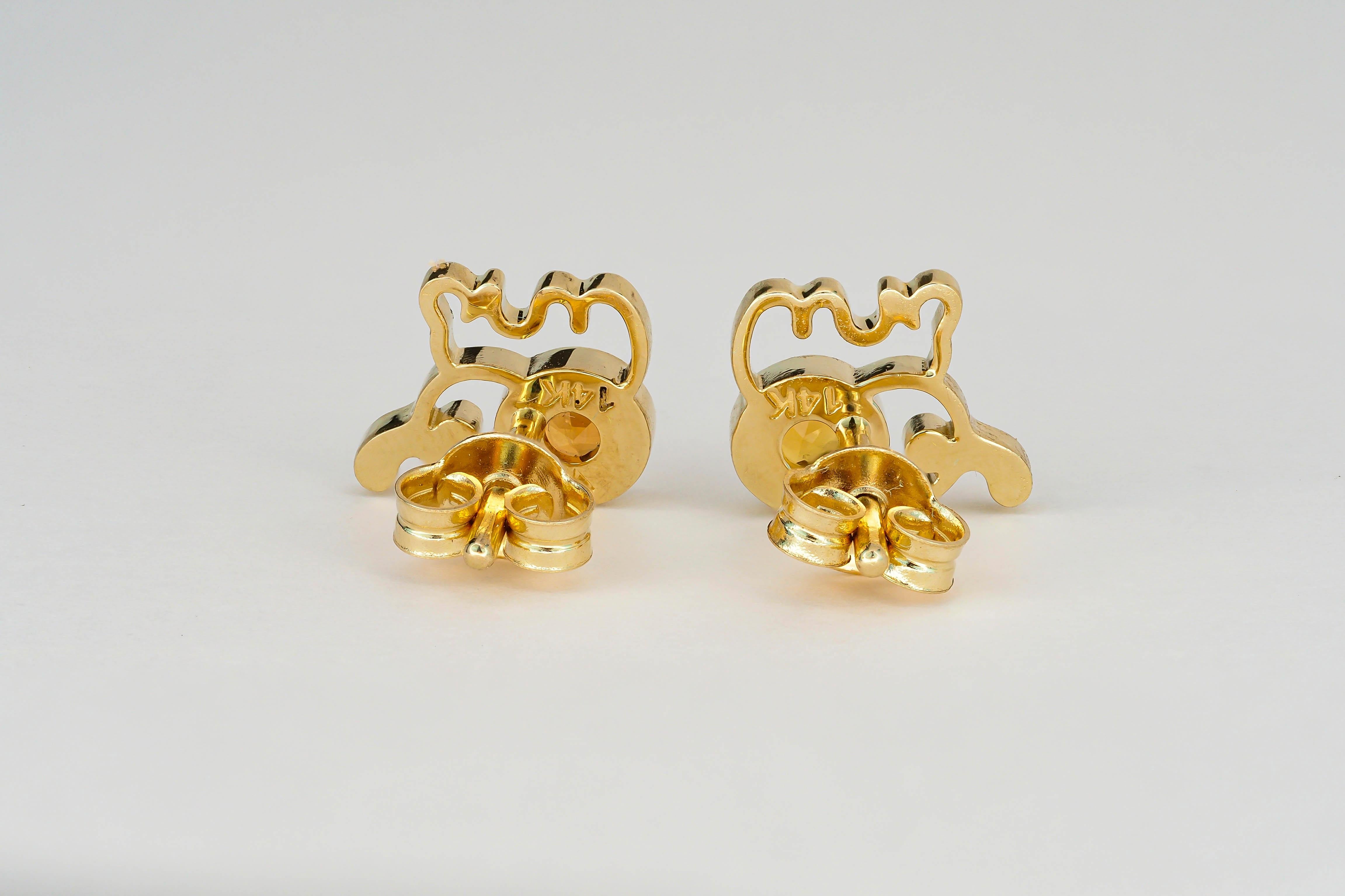 Modern 14k Gold Elephant Earrings Studs with Yellow Sapphires For Sale