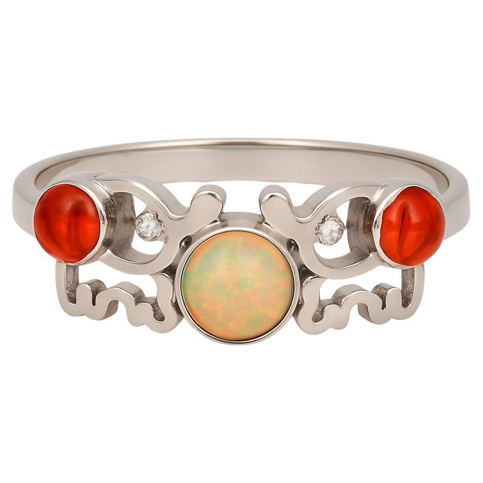 En vente :  Bague éléphant en or 14 carats avec opale, saphirs et diamants