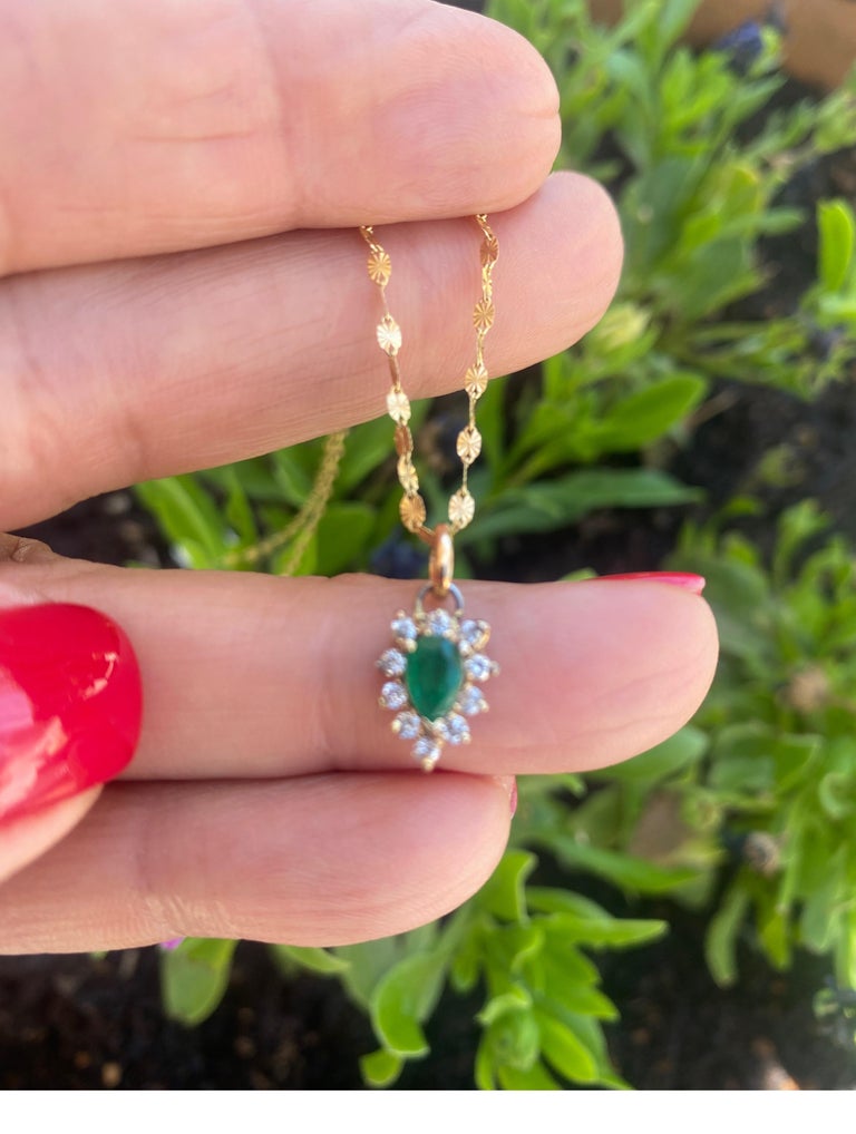 Contemporary 14K Gold Emerald and Diamond Pendant .80 TCW For Sale