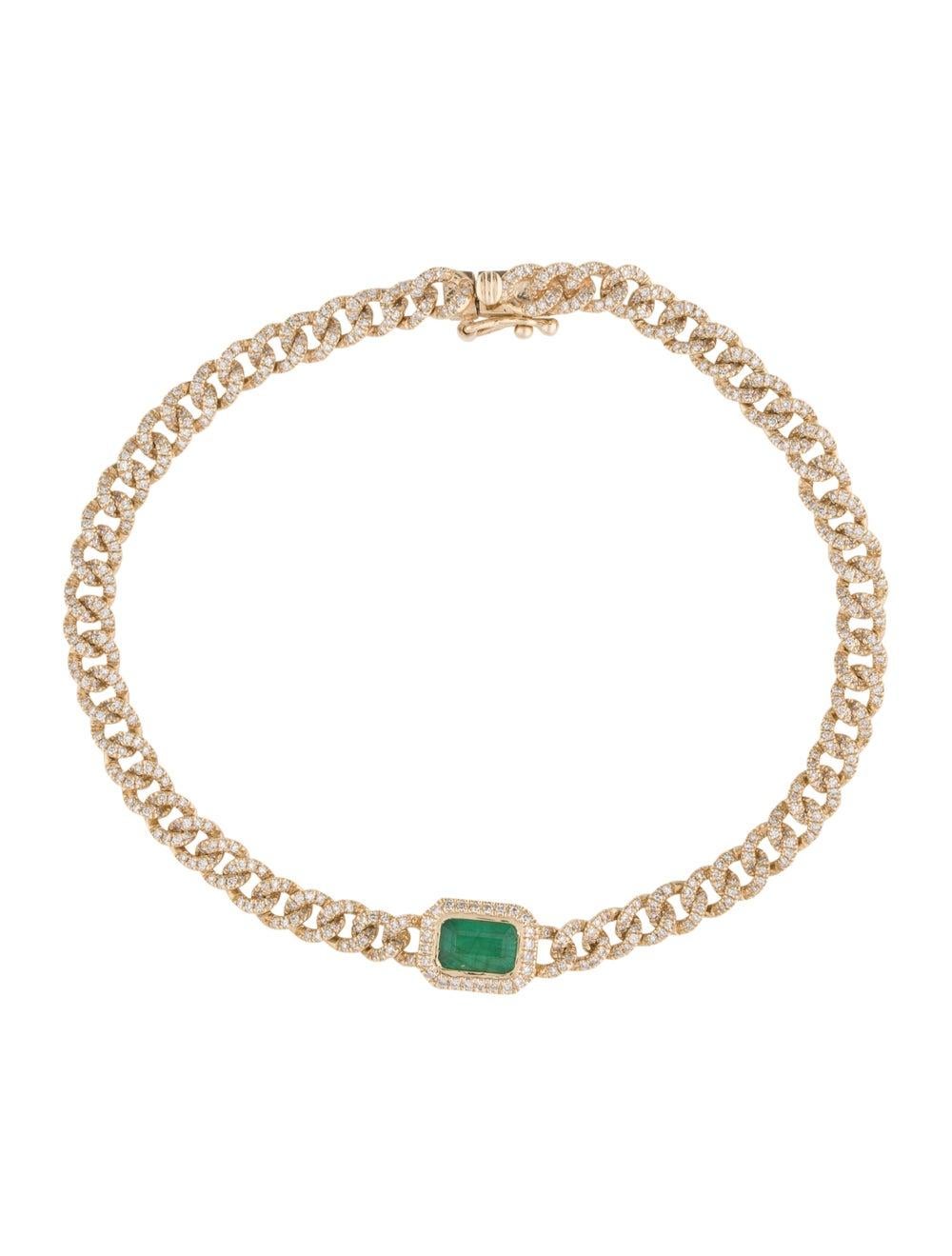 14K GOLD EMERALD & DIAMOND LINK BRACELET
     - Diamond Weight: 0.99 ct.
     - Emerald Weight: 0.53 ct.
     - Bracelet Length: 7 inches

This piece is perfect for everyday wear and makes the perfect Gift! 

We certify that this is an authentic
