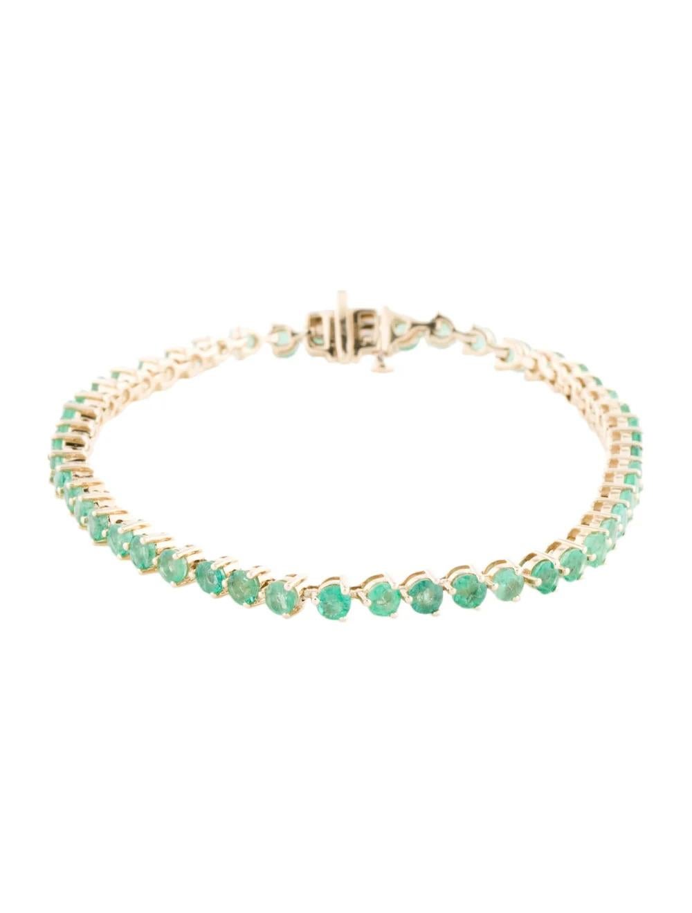 Elevate your style with this exquisite 14K Yellow Gold Emerald Link Bracelet, featuring a stunning 3.87 Carat Round Faceted Emerald, radiating timeless elegance and sophistication.

Specifications:

* Metal Type: 14K Yellow Gold
* Gemstone:
*