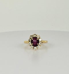 14k Gold Entourage Ring with 10 VVSI Brilliant Diamonds & 0.30 ct Star Ruby