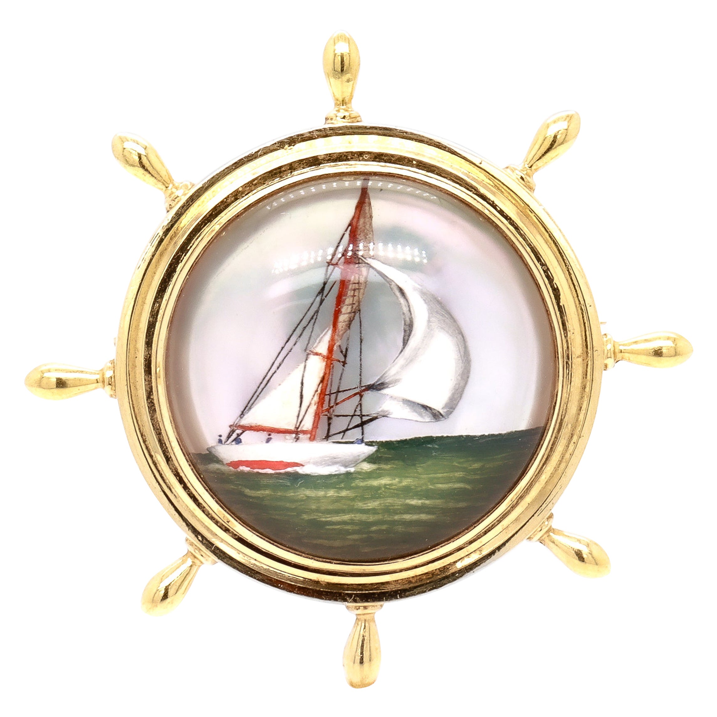 Broche de oro de 14 quilates y cristal de Essex con forma de rueda de barco y velero en el mar