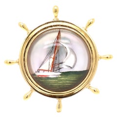 14K Gold & Essex Crystal Figural Ship's Wheel Brooch with a Sailboat at Sea