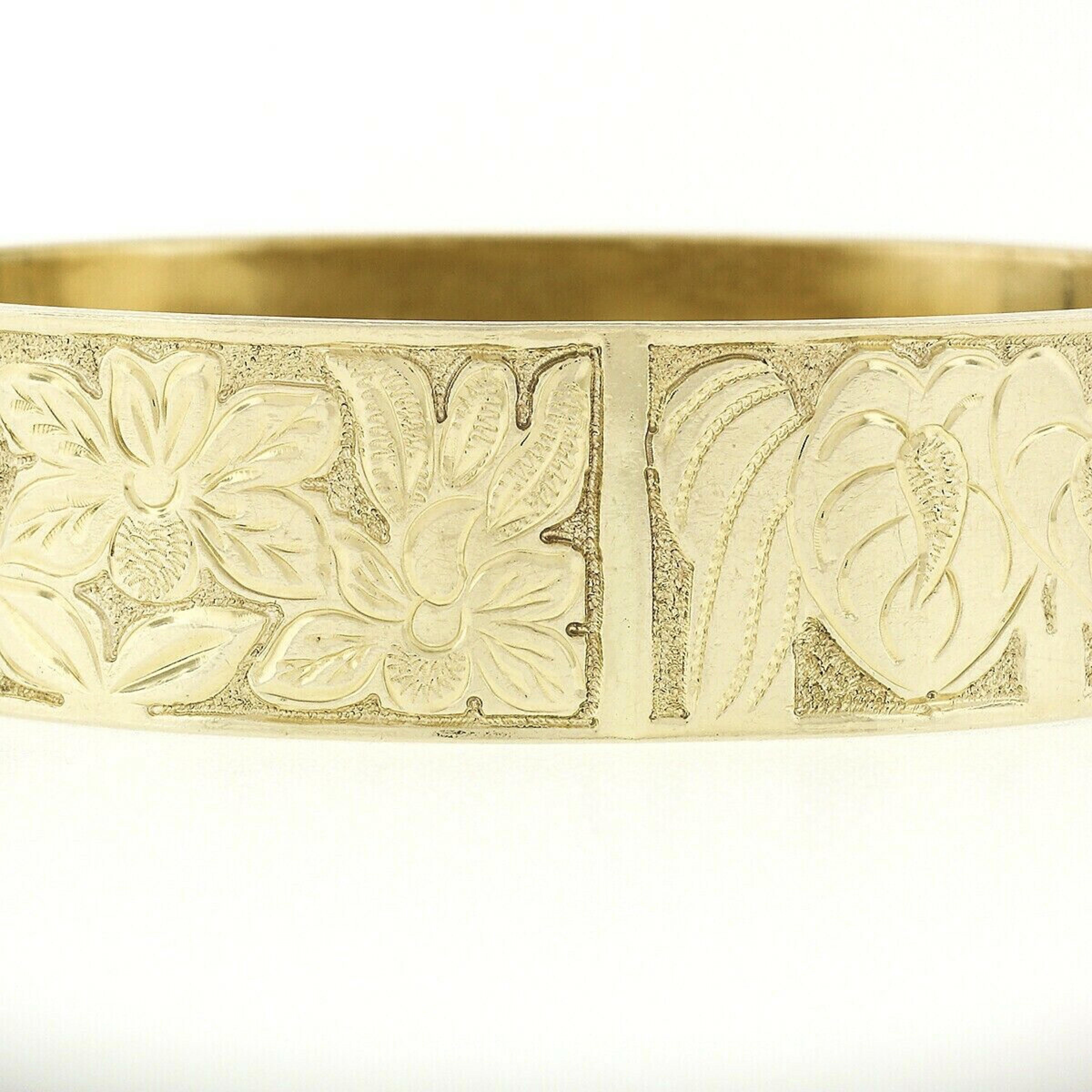 Here we have a very lovely slip-on bangle bracelet that was crafted from solid 14k yellow gold. It features 6 rectangular shaped panels which depict flowers, leaves, and a pair of turtles. At the center there is a square shaped panel displaying a