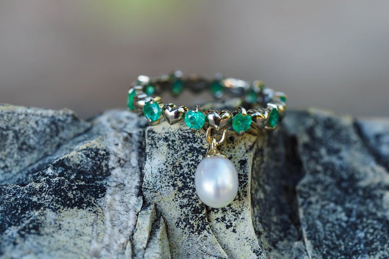 For Sale:  14 Karat Gold Eternity Ring with Emeralds and Pearl. Emerald eternity ring 9