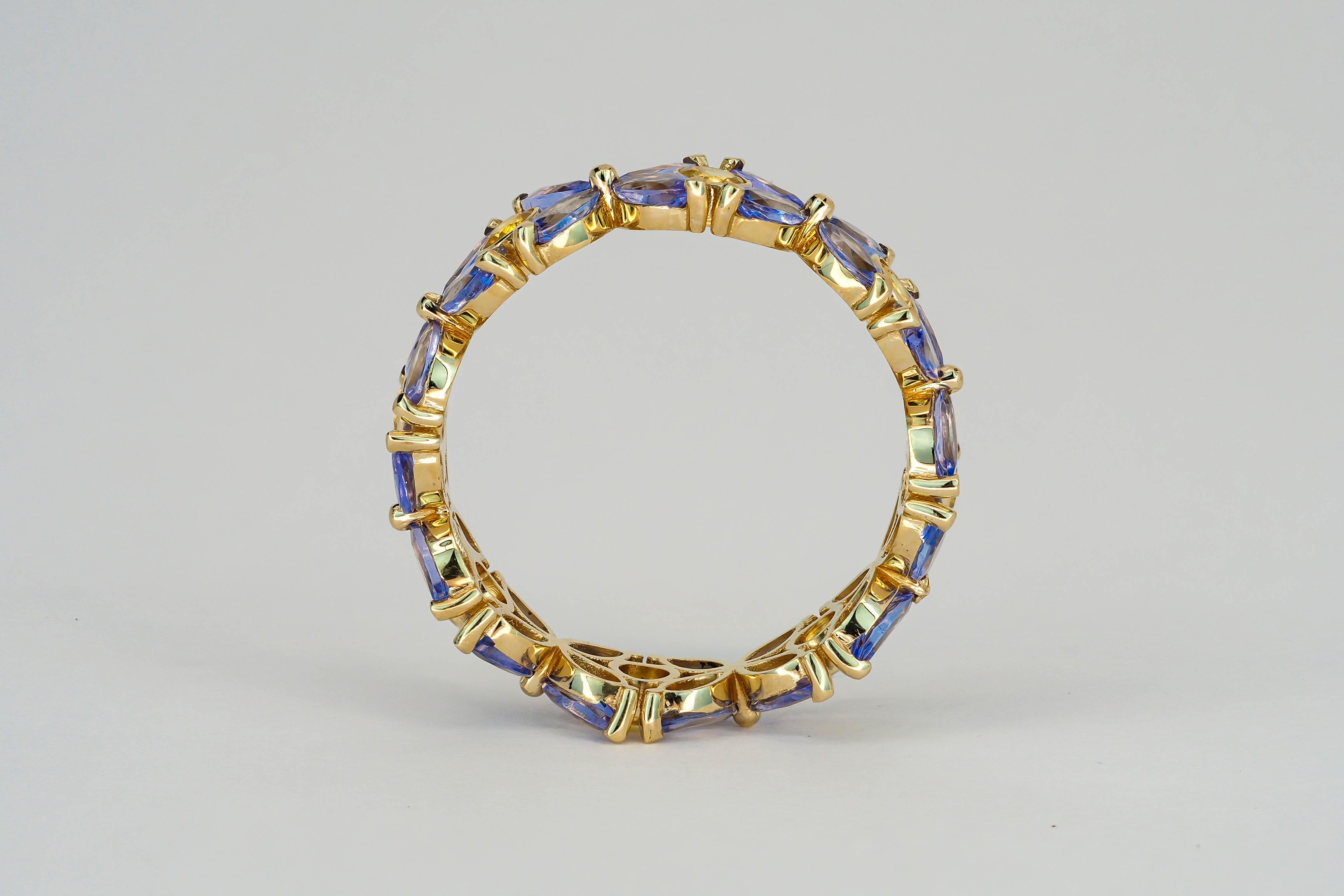 For Sale:  Sapphires and Tanzanites eternity ring in 14k gold 9