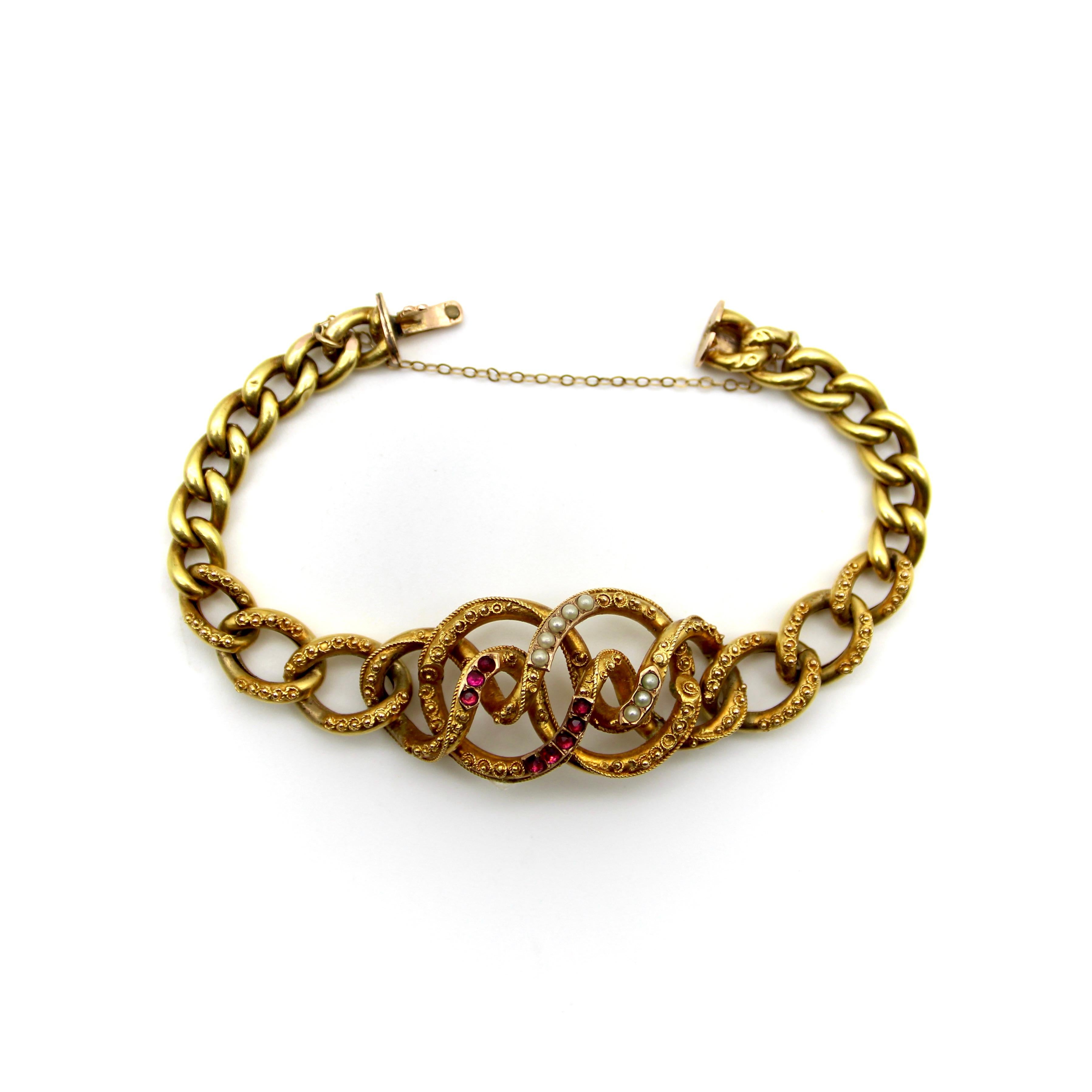 Single Cut 14K Gold Etruscan Revival Lover’s Knot Bracelet with Garnets and Pearls For Sale