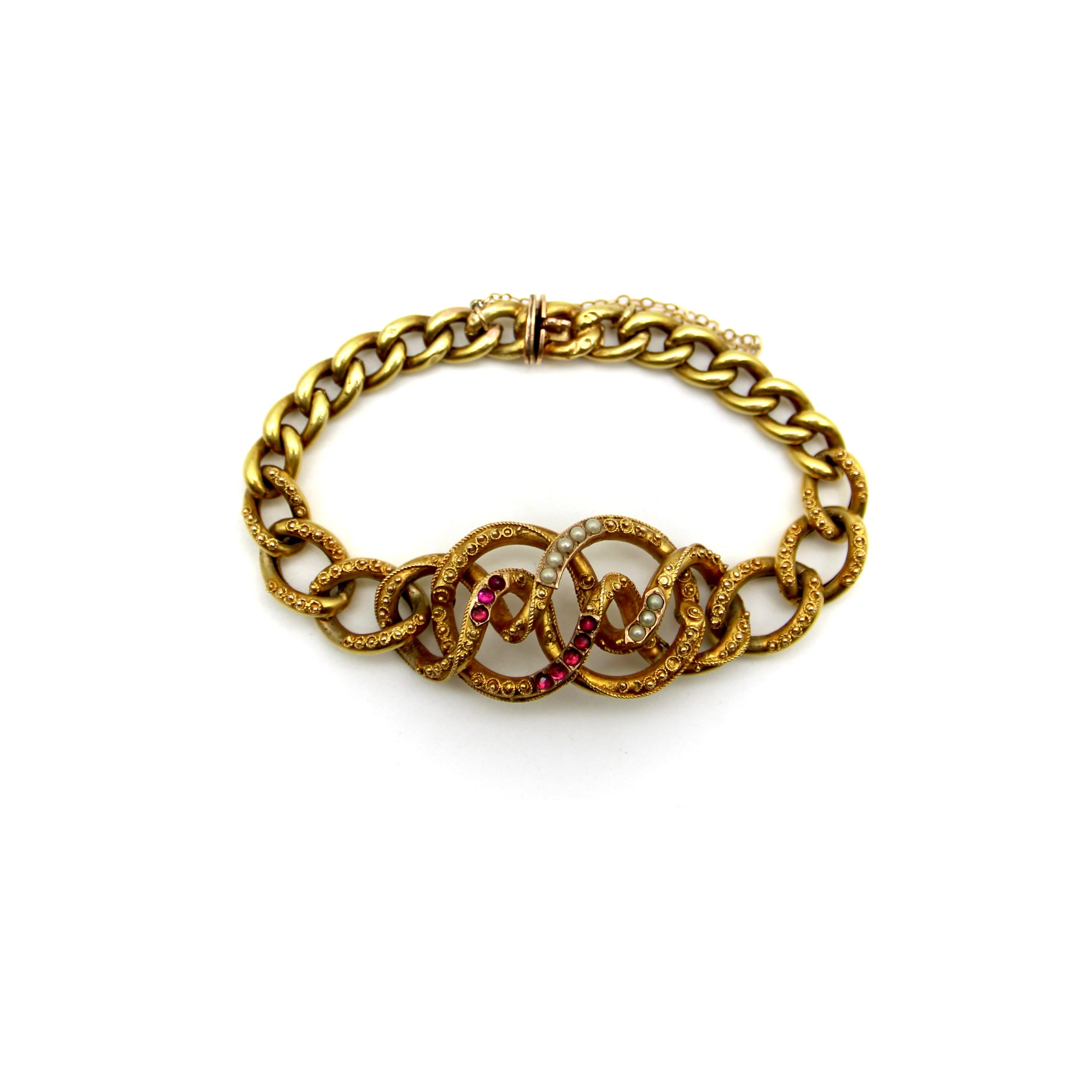 14K Gold Etruscan Revival Lover’s Knot Bracelet with Garnets and Pearls In Good Condition For Sale In Venice, CA