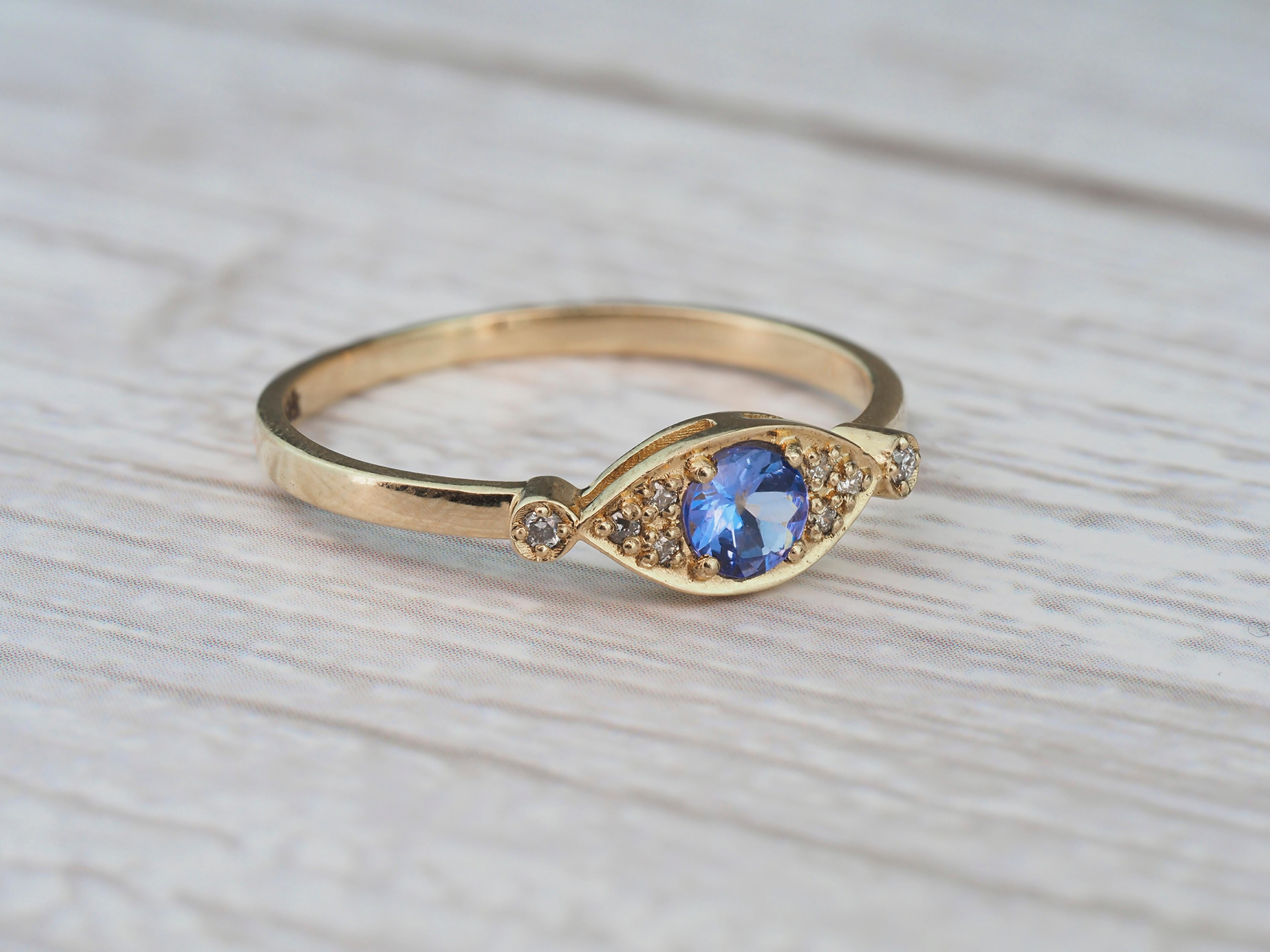 Im Angebot: 14 Karat Gold Ring „Eye“ mit Tansanit und Diamanten () 10