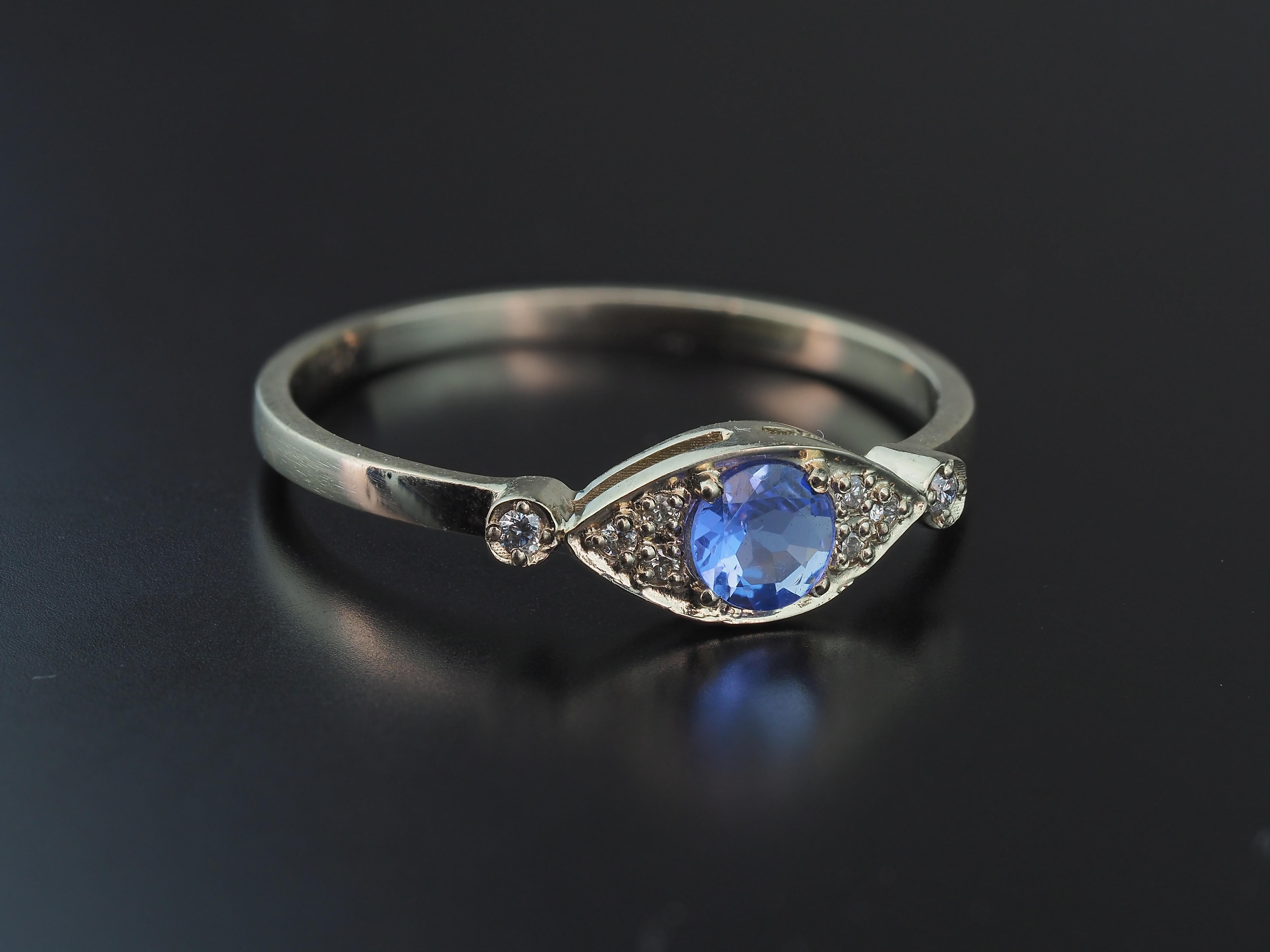 Im Angebot: 14 Karat Gold Ring „Eye“ mit Tansanit und Diamanten () 4