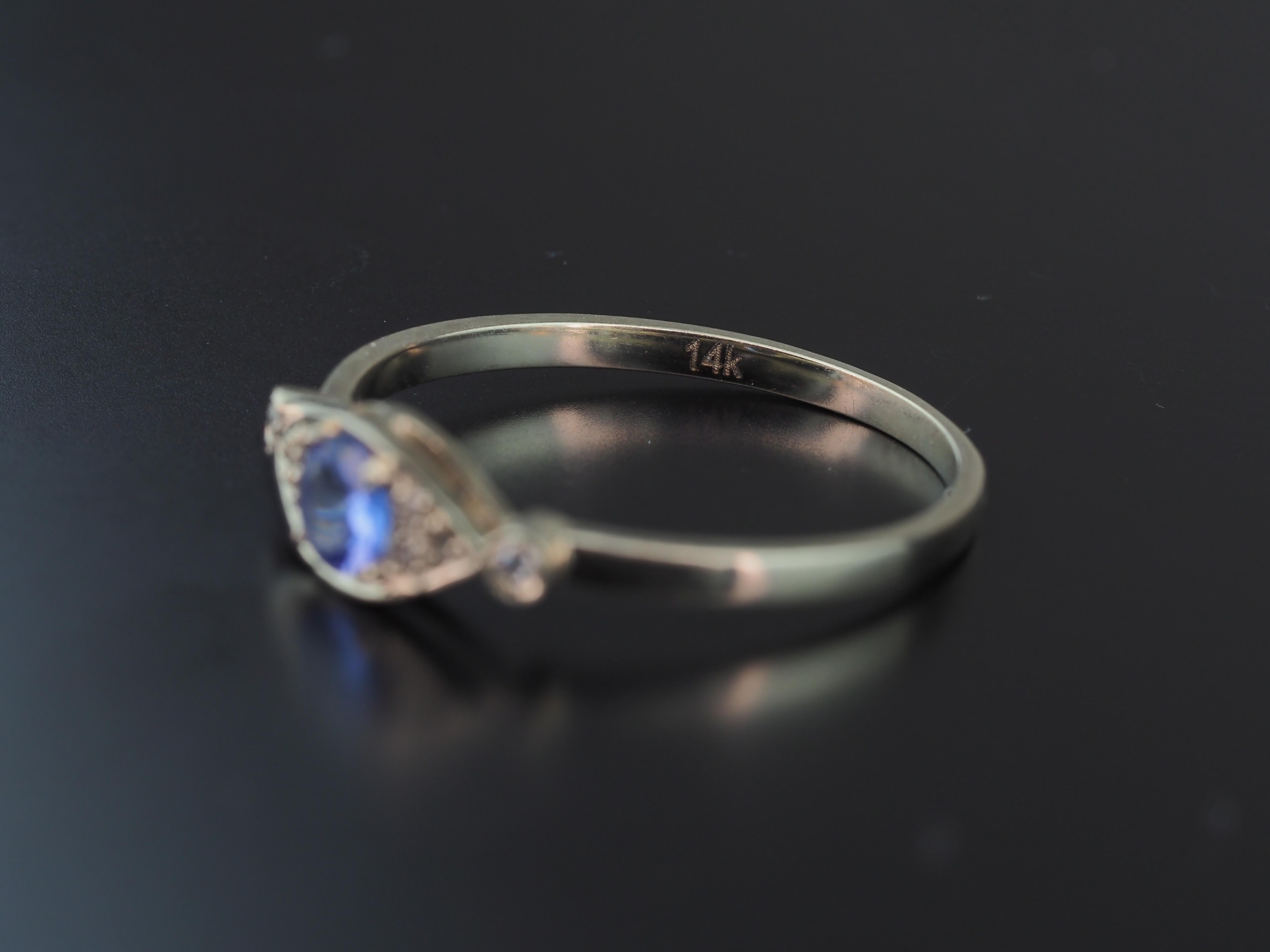 Im Angebot: 14 Karat Gold Ring „Eye“ mit Tansanit und Diamanten () 6