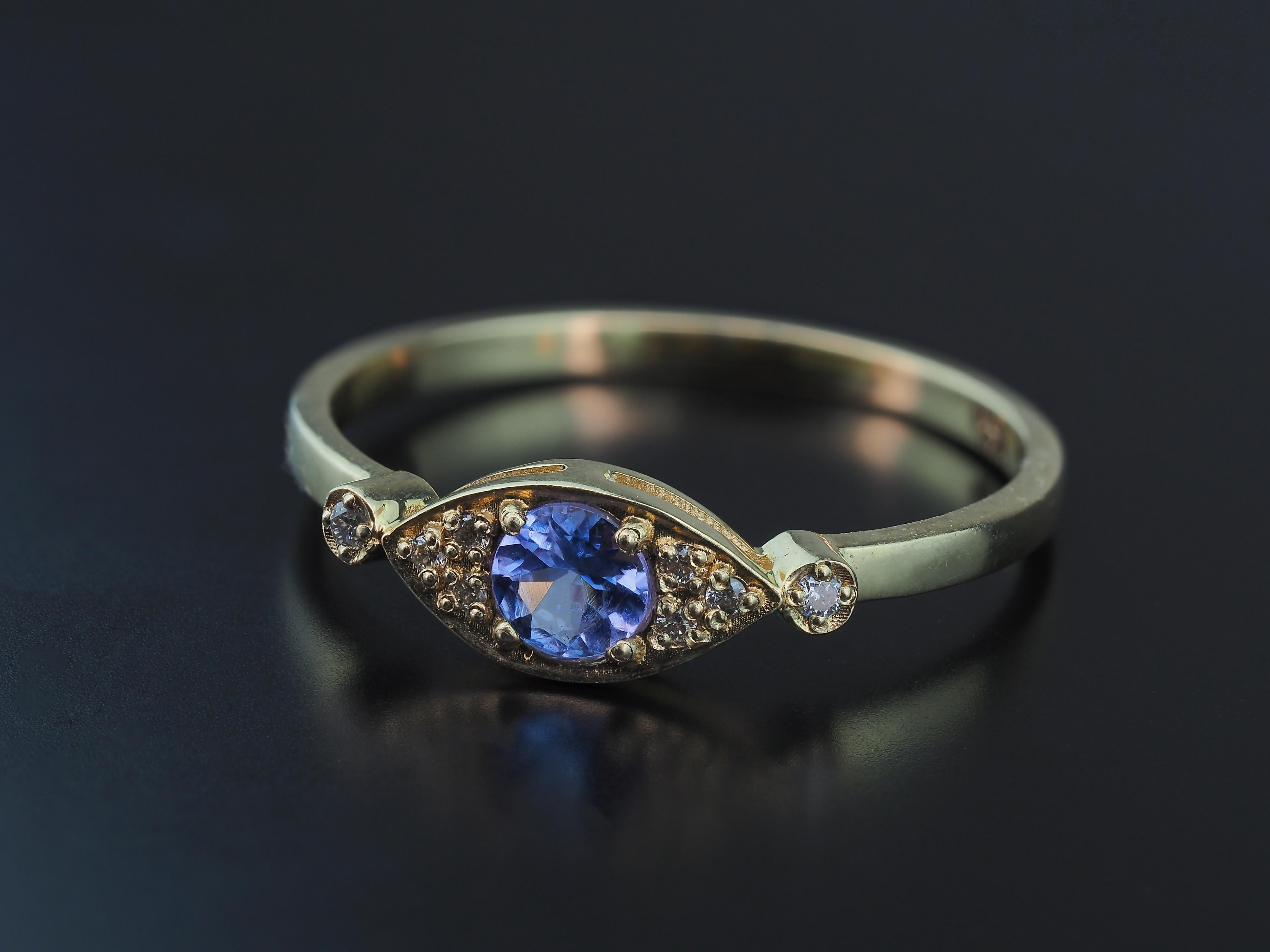 For Sale:  Evil eye tanzanite 14k gold ring 9