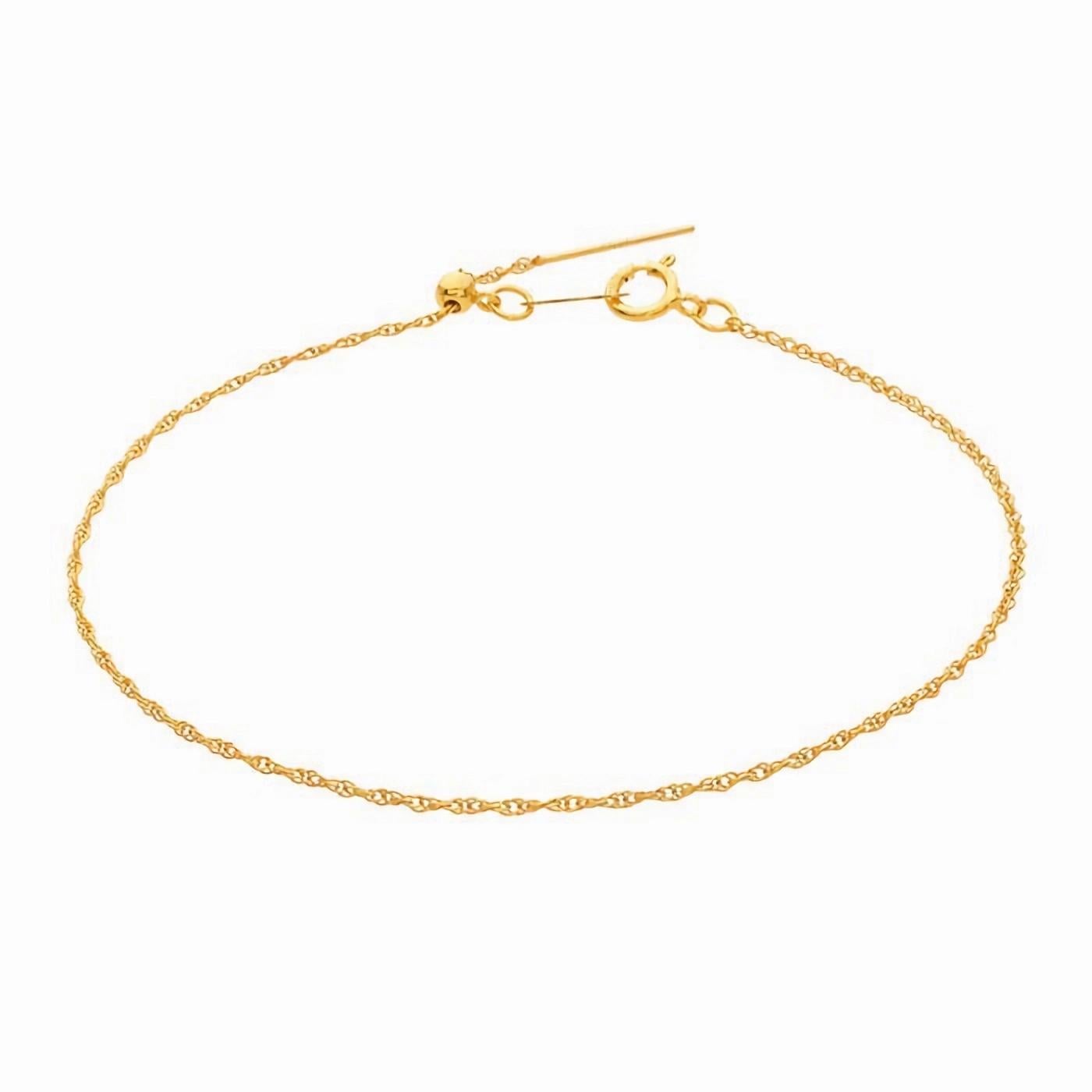 Rehaussez votre style avec le superbe bracelet en chaîne à corde réglable en or jaune 14/20 de Mona Jewelry, créant ainsi un bijou polyvalent et adaptable à l'infini. L'extrémité de la chaîne est terminée par une tige ronde (.025