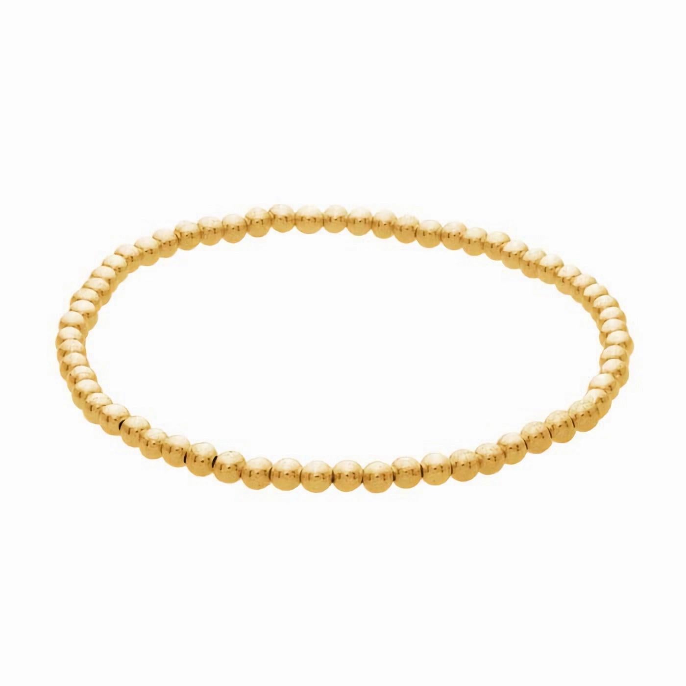 Eleva il tuo stile con il raffinato braccialetto elastico con perline di Mona Jewelry. Questo bracciale elastico in oro giallo 14/20 presenta perline rotonde da 2 mm, infilate in un cordino elastico per essere indossate con facilità. Perfetta da