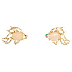 Boucles d'oreilles poisson en or 14k serties d'or 14k. 