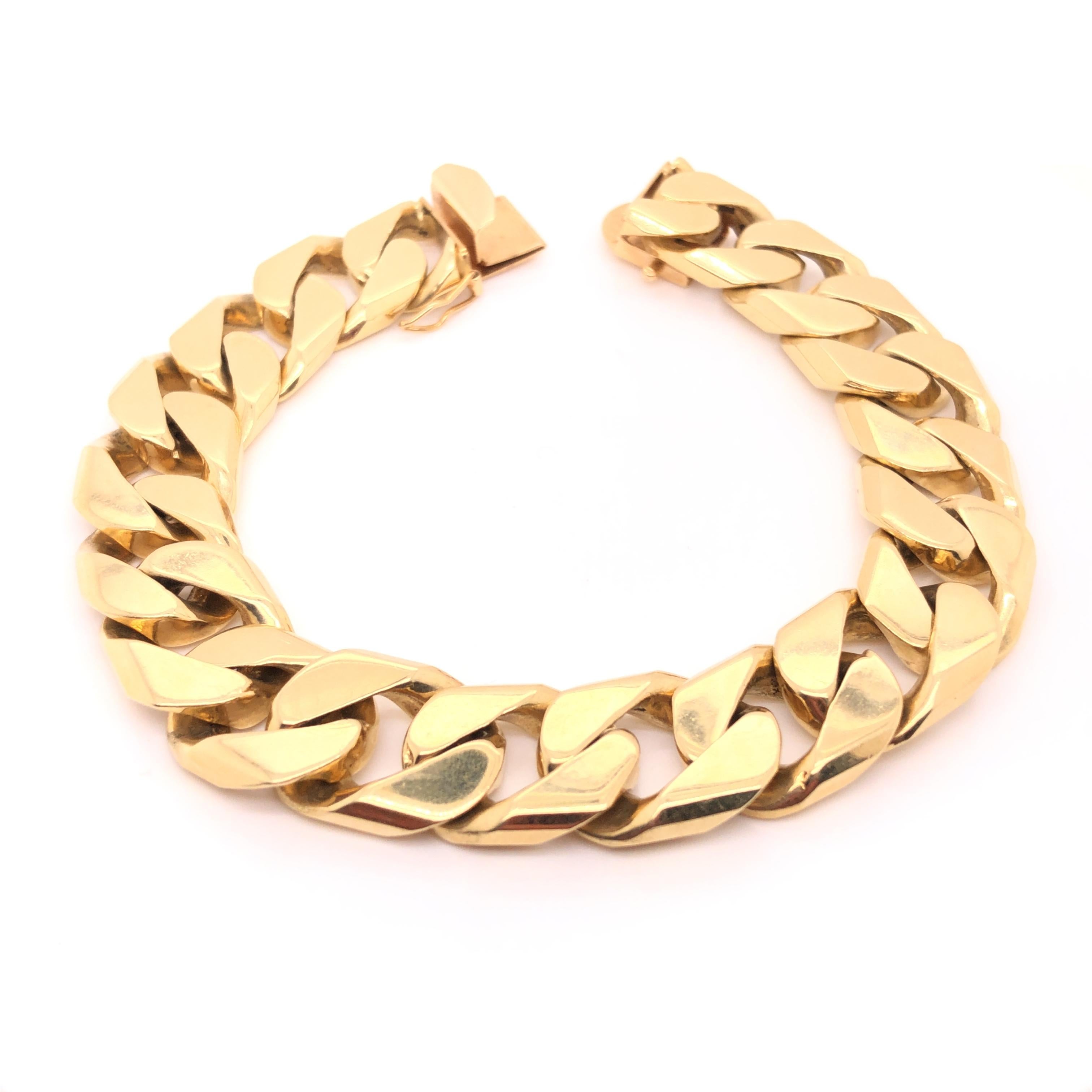 A beautiful flattened curb link chain crafted from 14K solid gold.