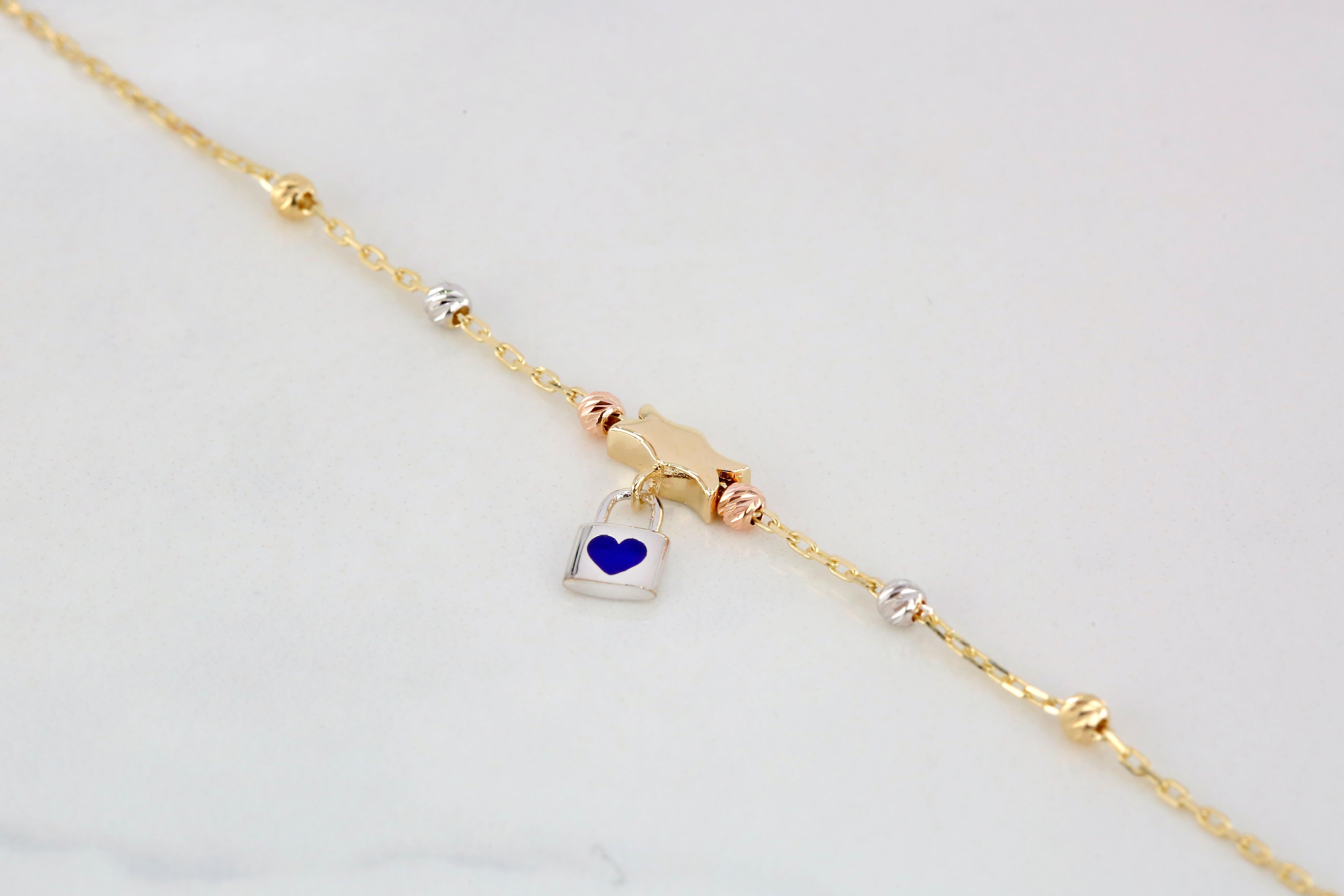 Women's 14K Gold Fleur and Padlock Charm Dainty Beaded Bracelet For Sale