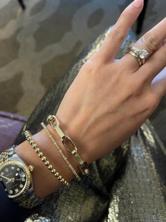 Armreif aus 14 Karat Gold mit flexiblem Diamantbesatz, Stapelarmband, Diamantarmband