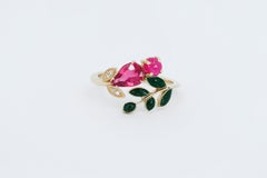 Tourmaline, Ruby and diamonds 14 karat gold ring.