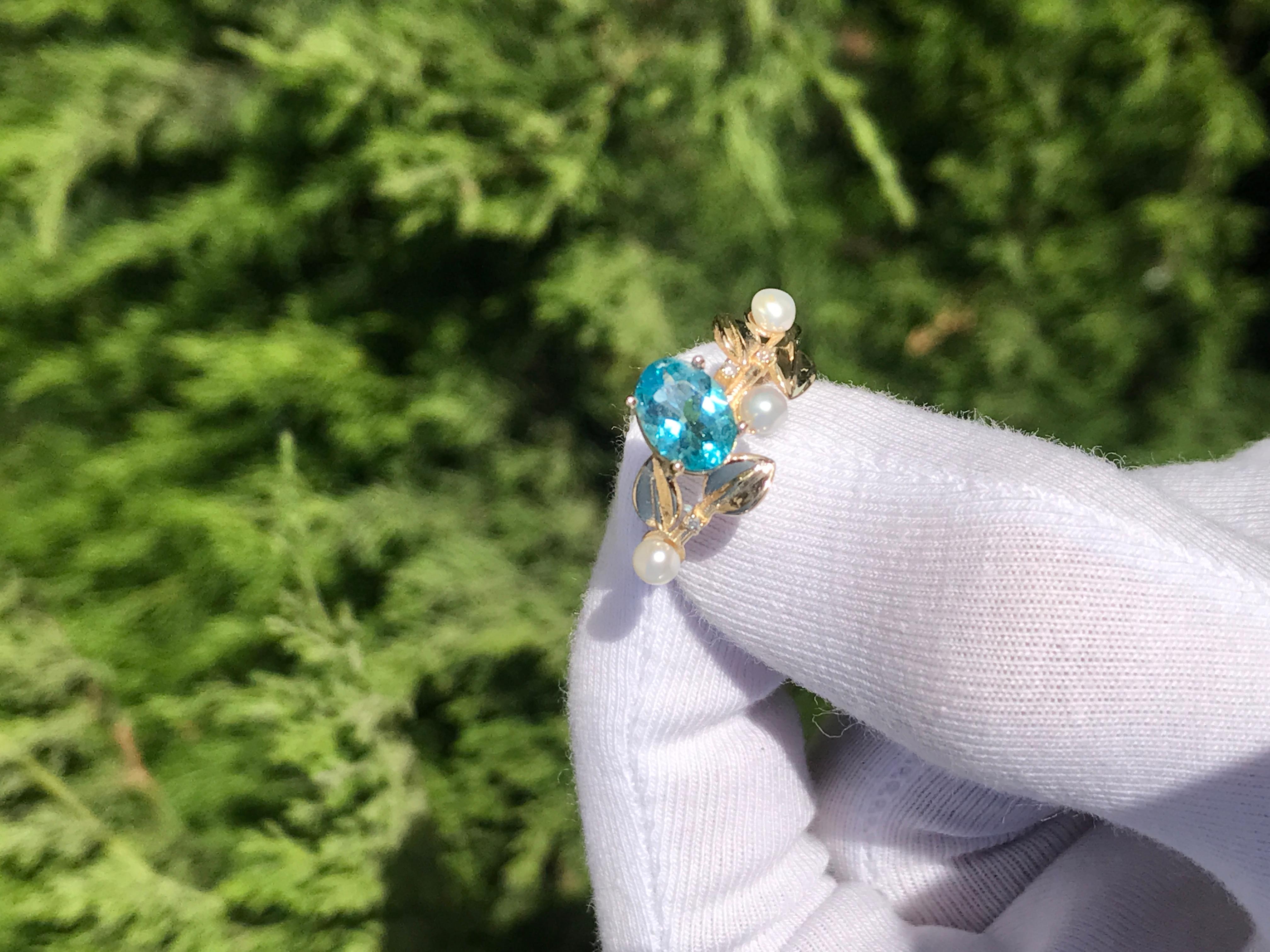Modern 14k gold floral ring with oval neon paraiba apatite, diamonds and pearls.  For Sale