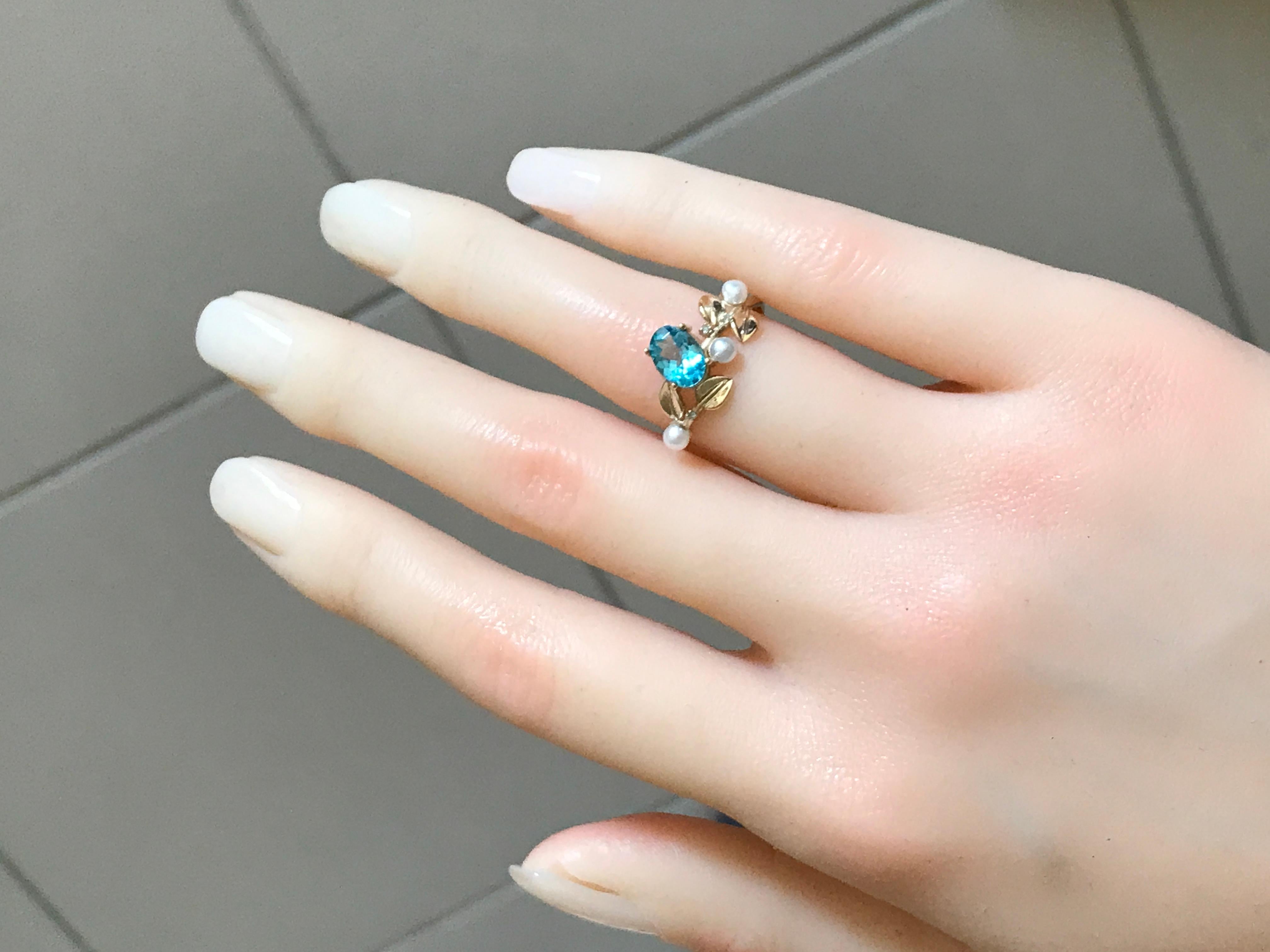 Oval Cut 14k gold floral ring with oval neon paraiba apatite, diamonds and pearls.  For Sale