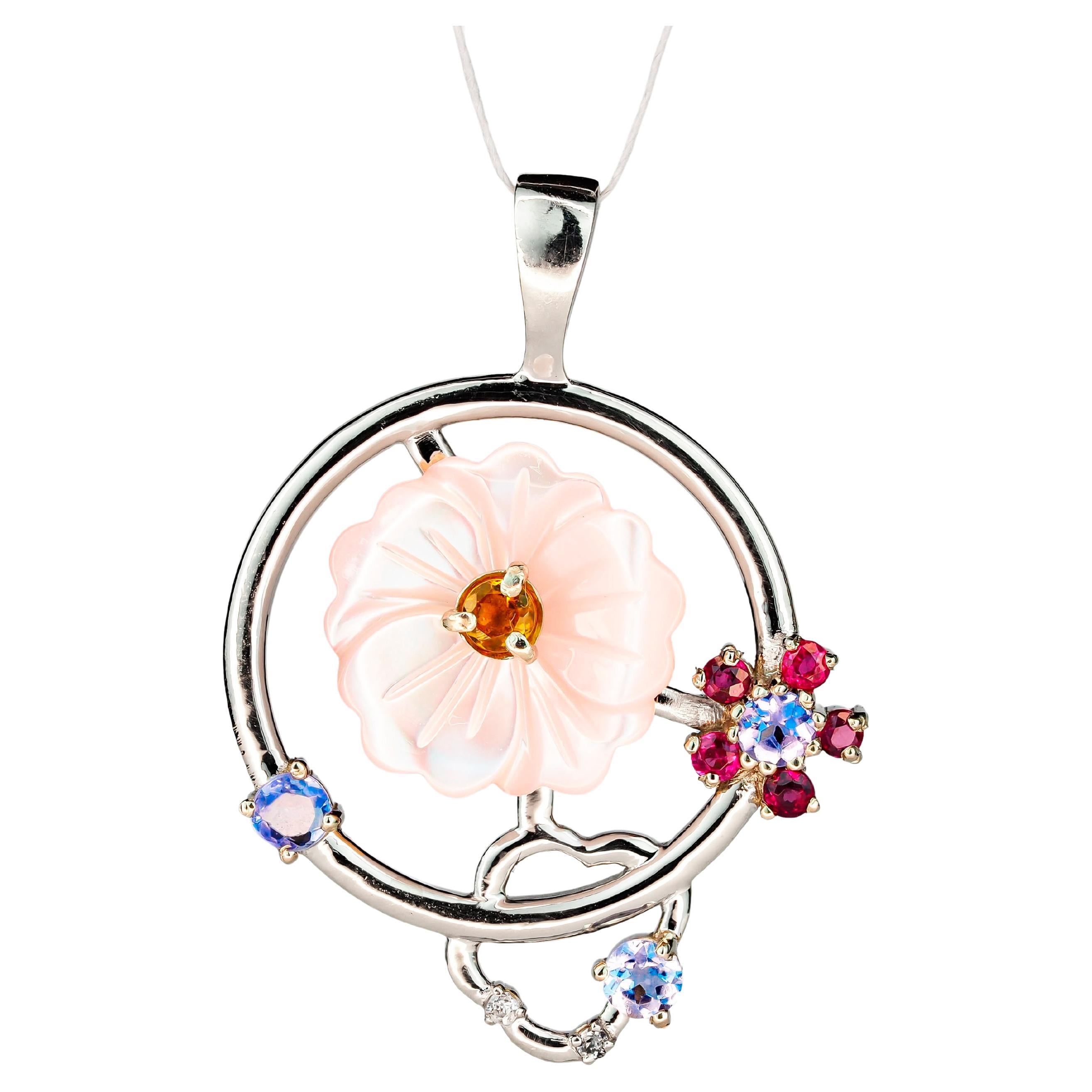 Colgante flor con piedras preciosas de color en oro de 14k