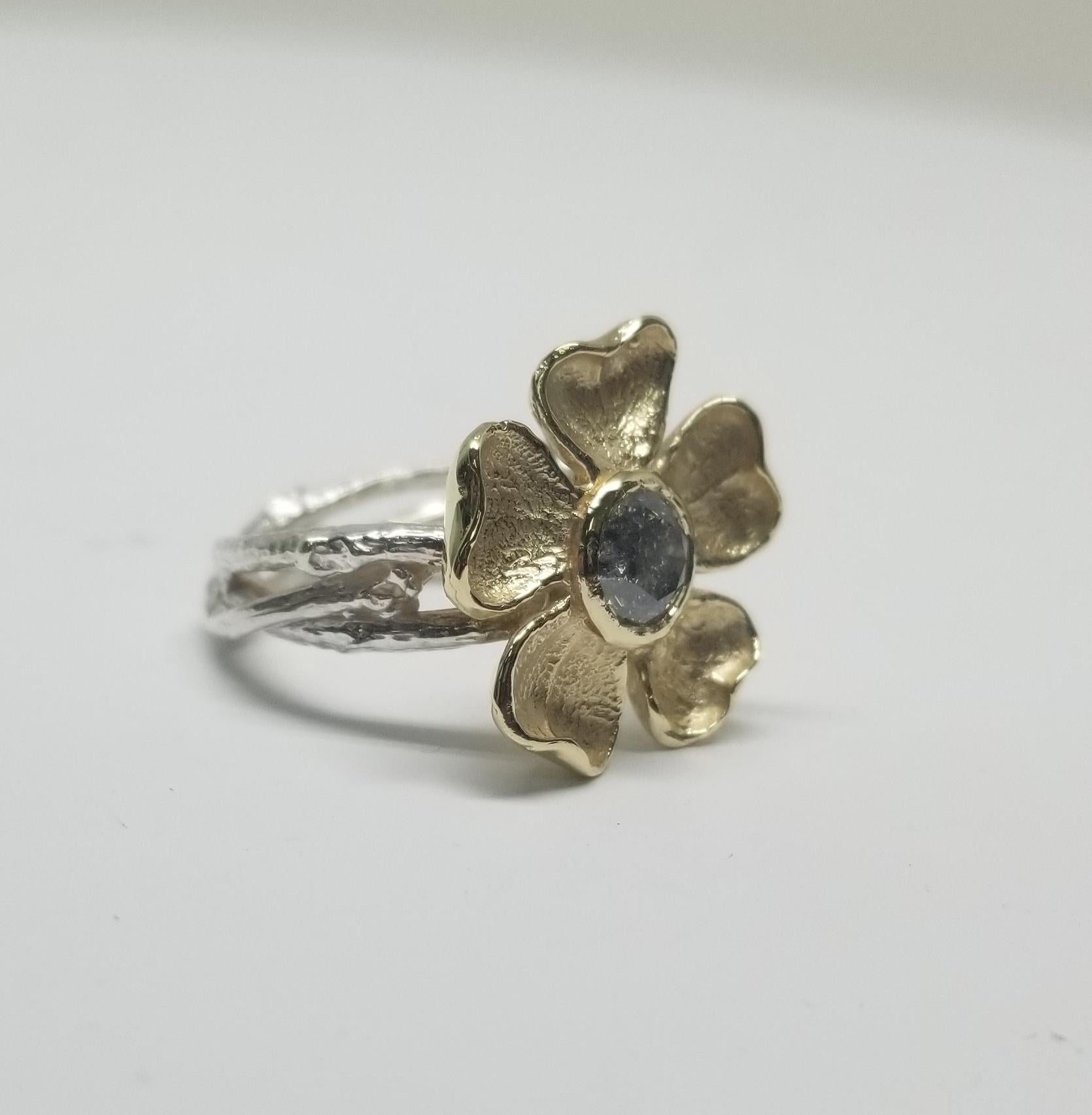 14k yellow gold flower on a 