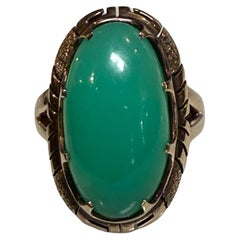 Anello con pietra crisofrasa verde in oro 14K