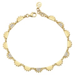 Bracelet gitane en or 14 carats avec diamants de 0,25 carat