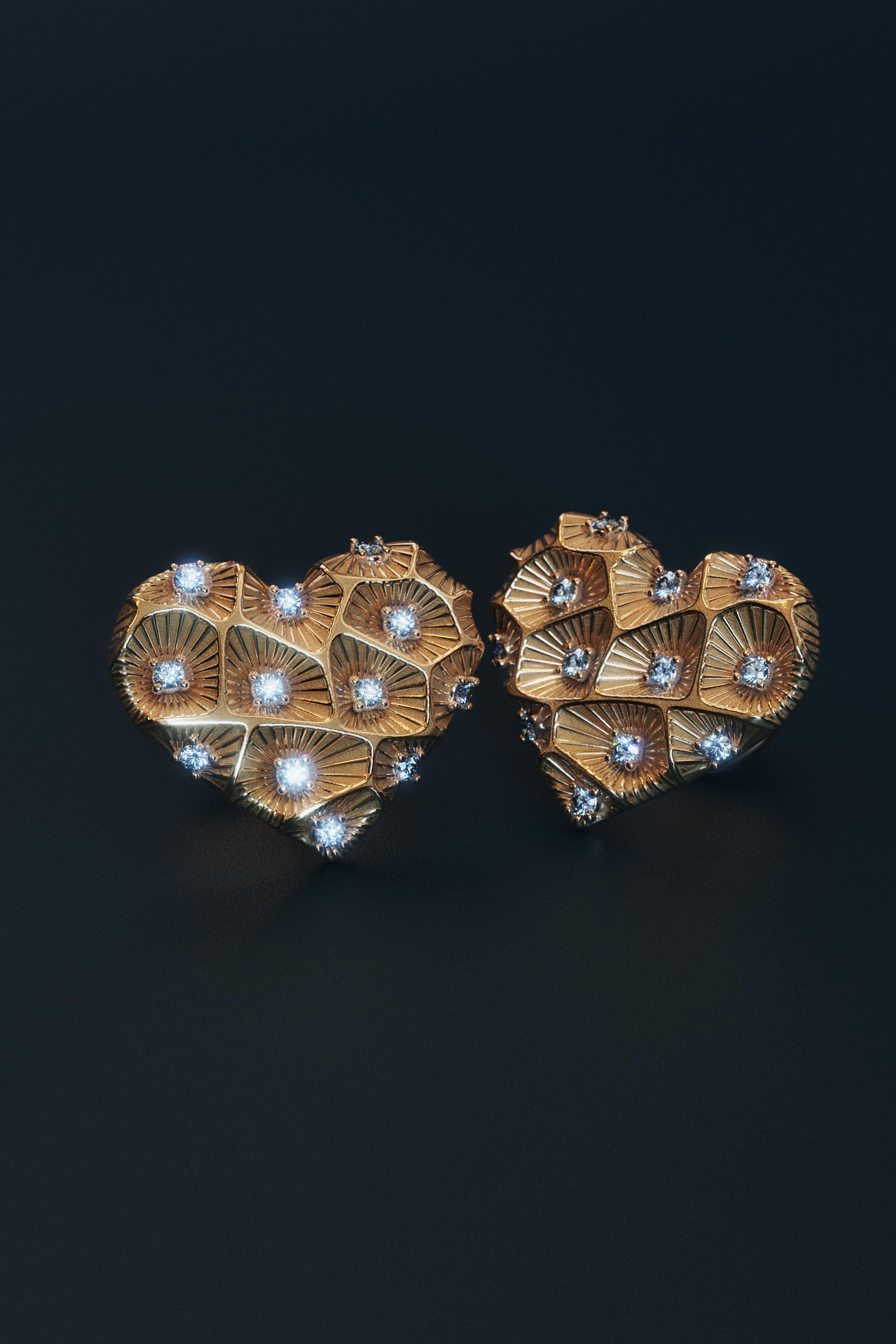 Made to order Heart Diamond Stud Earrings – 14K Solid Gold – Handmade in Italy

Celebrate love and elegance with these heart-shaped stud earrings from the Calypso Collection. Featuring a unique coral-textured surface and set with 0.16 carats of