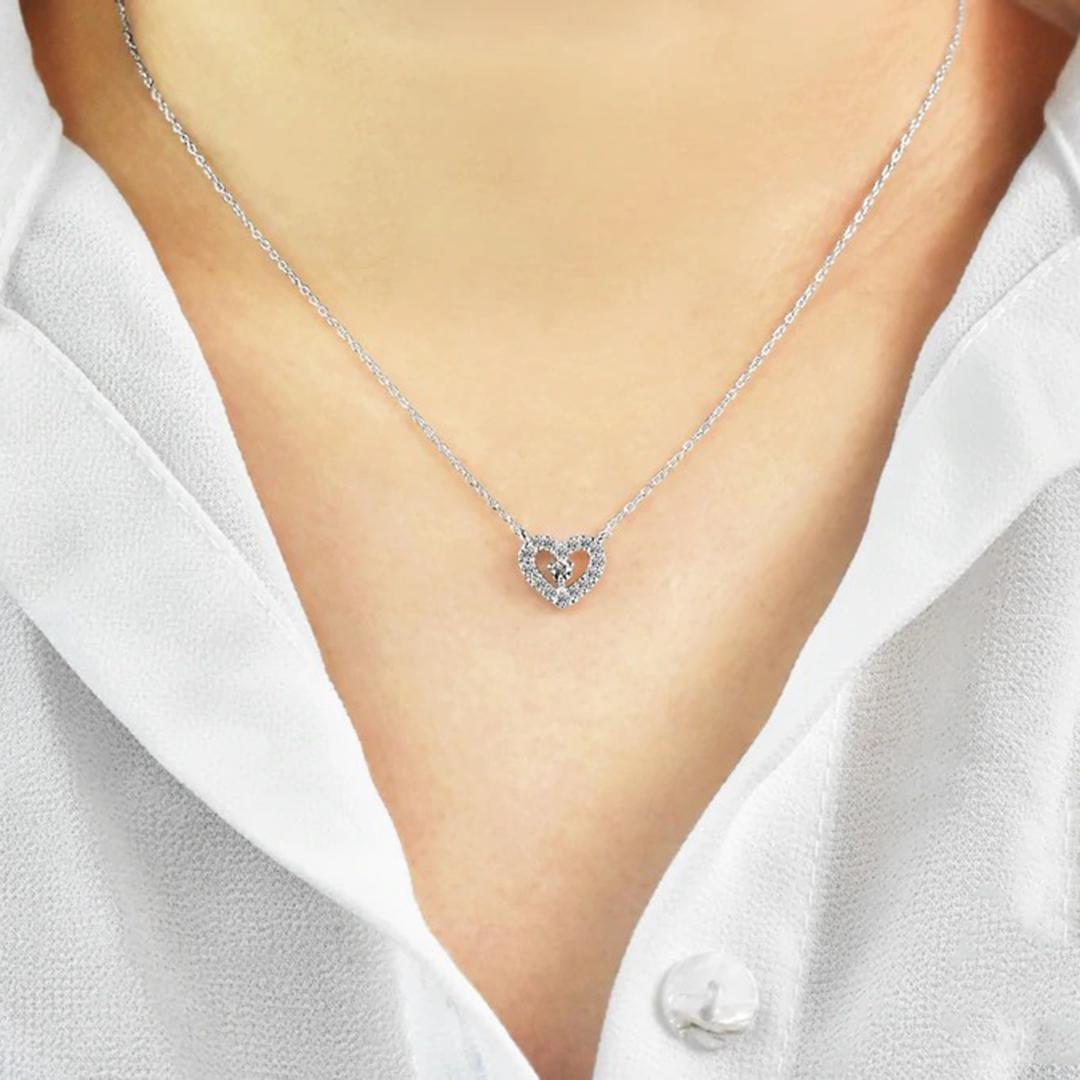 Heart Shaped Diamond Necklace 9.77 mm. x 10.70 mm. is made of 14k solid gold available in three colors, White Gold / Rose Gold / Yellow Gold.

Lightweight and gorgeous natural genuine round cut diamond. Each diamond is hand selected by me to ensure