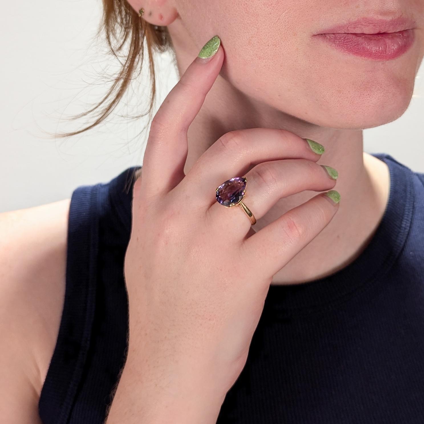 A fine estate cocktail ring.

In 14k yellow gold.

Claw set with a large pear cut amethyst gemstone in a high-set setting.

Simply a wonderful, classic ring!

Date:
20th Century

Overall Condition:
It is in overall good, as-pictured, used estate