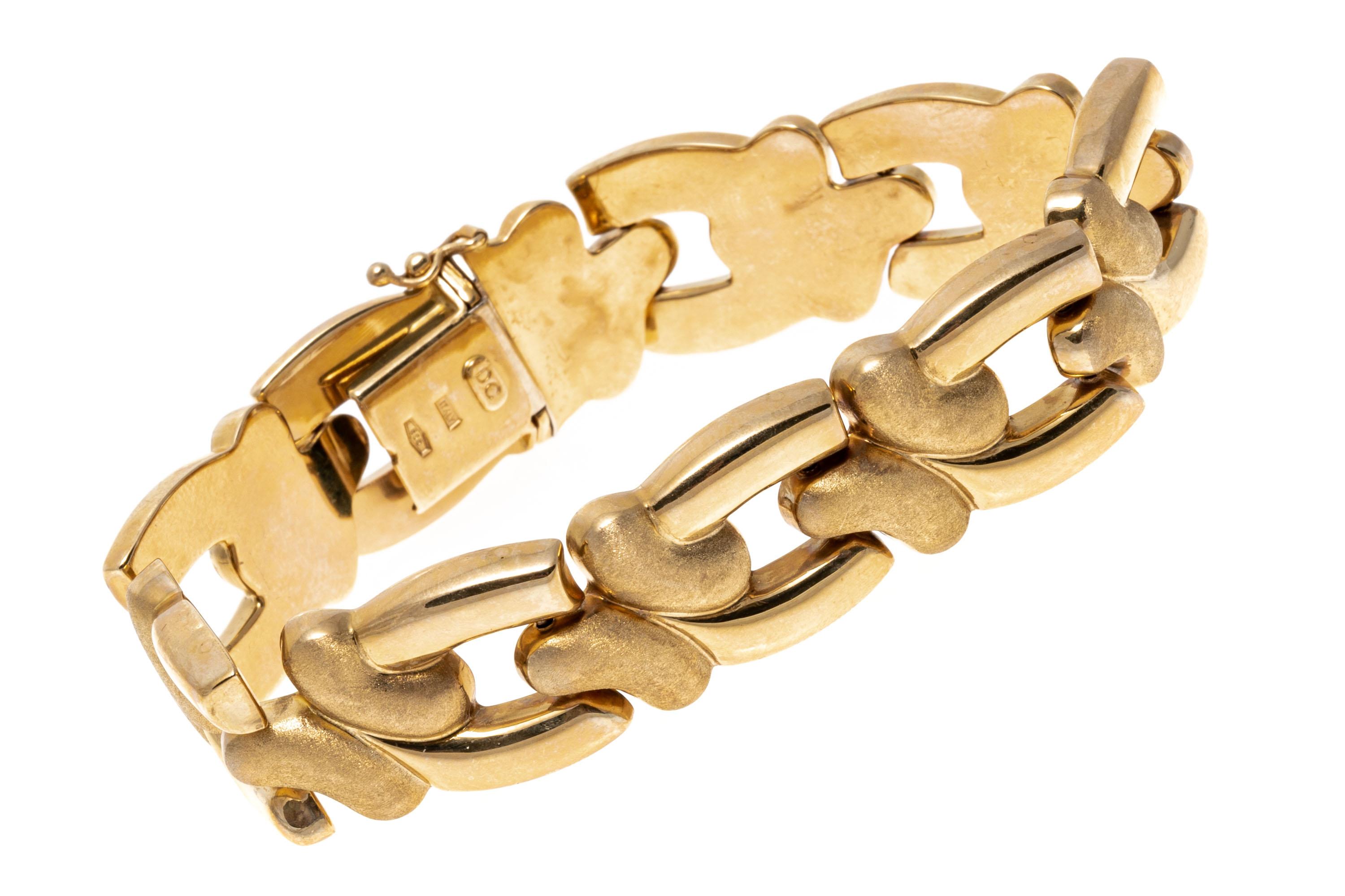 14K Yellow Gold Brushed and Polished Puffed Swirl Link Bracelet In Good Condition For Sale In Southport, CT