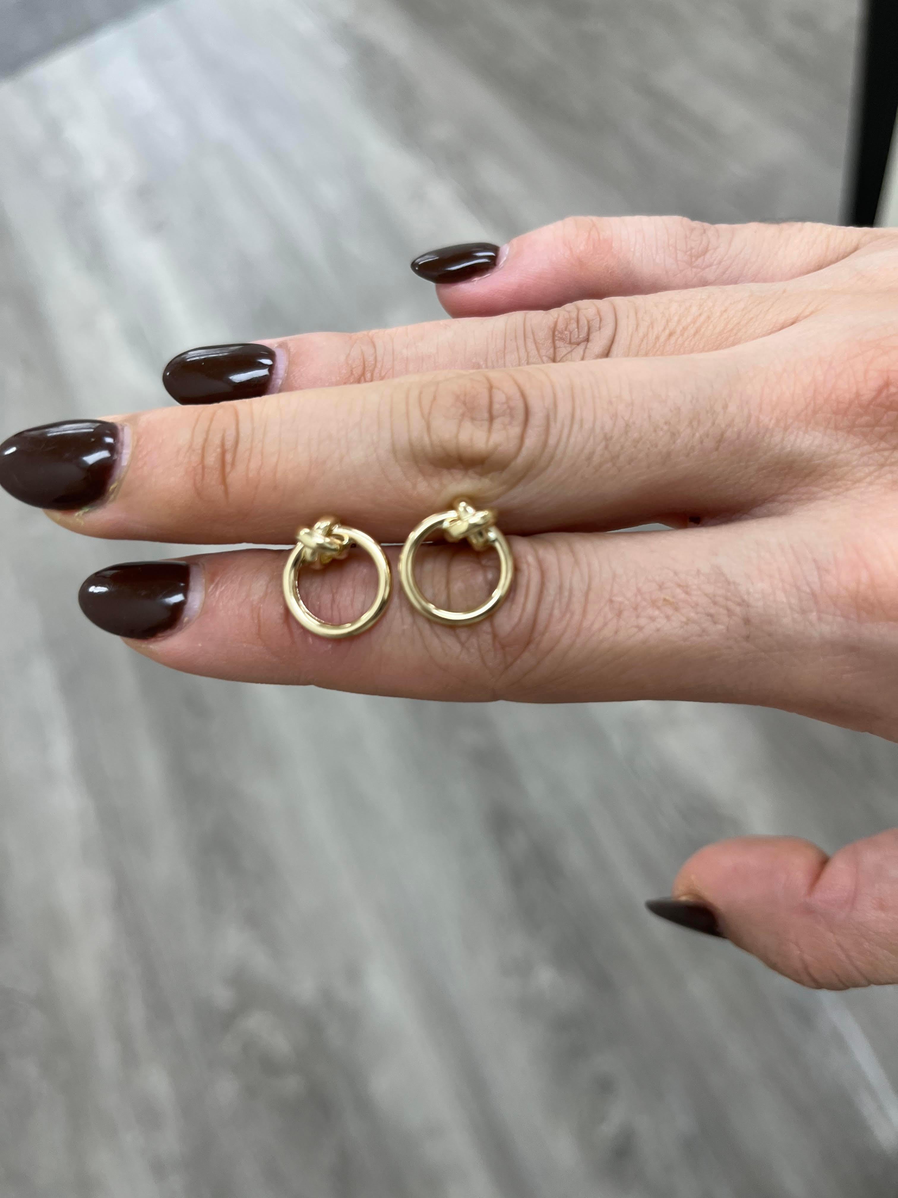 14K Gold Knot Circle Earrings 

- 0.50 inches
- 1.90 grams ( approx.)

This piece is perfect for everyday wear and makes the perfect Gift! 

We certify that this is an authentic piece of Fine jewelry. Every piece is crafted with the utmost care and