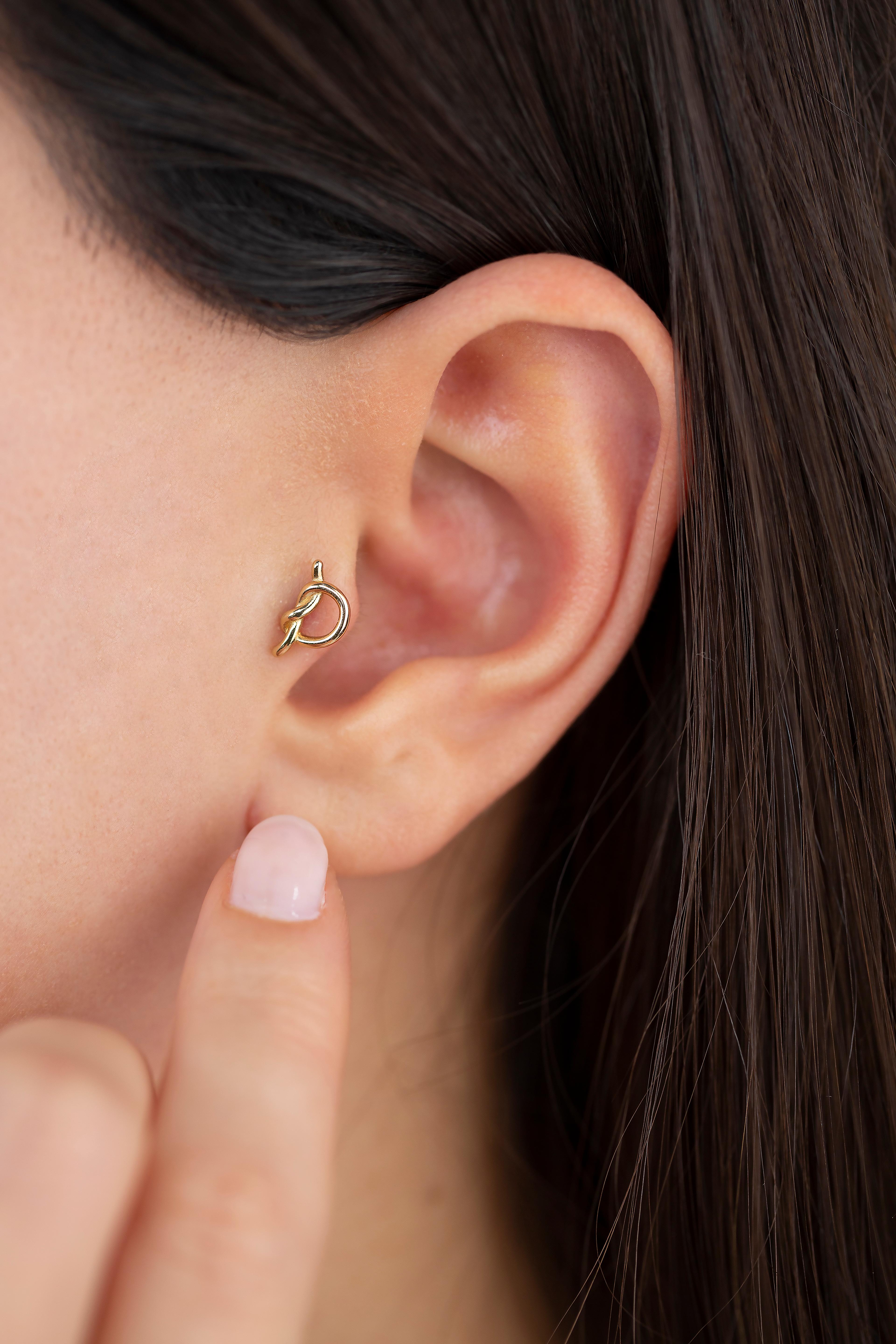 14K Gold Knot Piercing, Love Knot Gold Stud Earring

You can use the piercing as an earring too! Also this piercing is suitable for tragus, nose, helix, lobe, flat, medusa, monreo, labret and stud.

This piercing was made with quality materials and