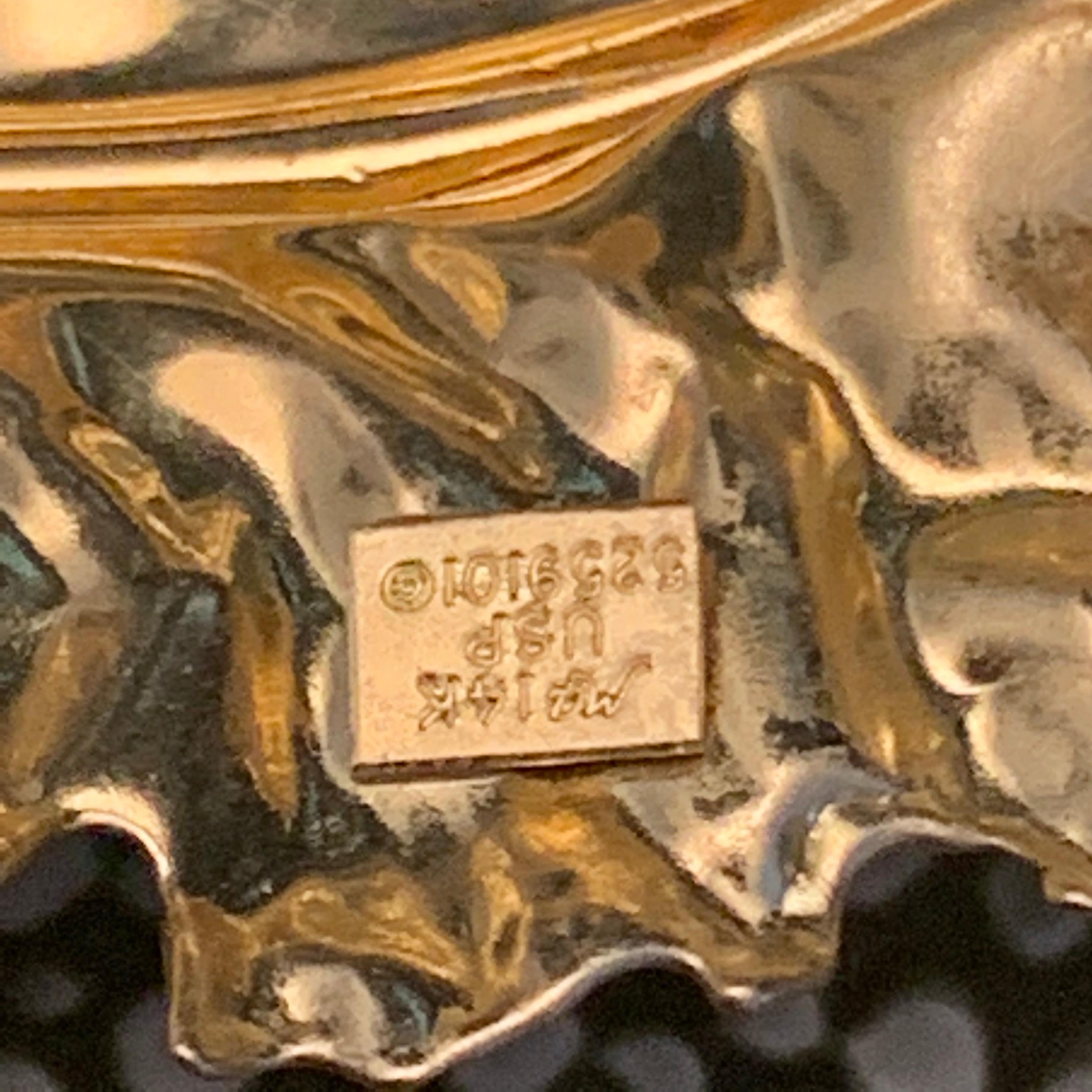 Spillone a foglia d'oro 14k, 2 pollici x 1 pollice

Condizioni perfette