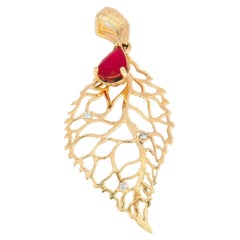 14 Karat Gold "Leaf" Pendant with Ruby and Diamonds. July birthstone pendant
