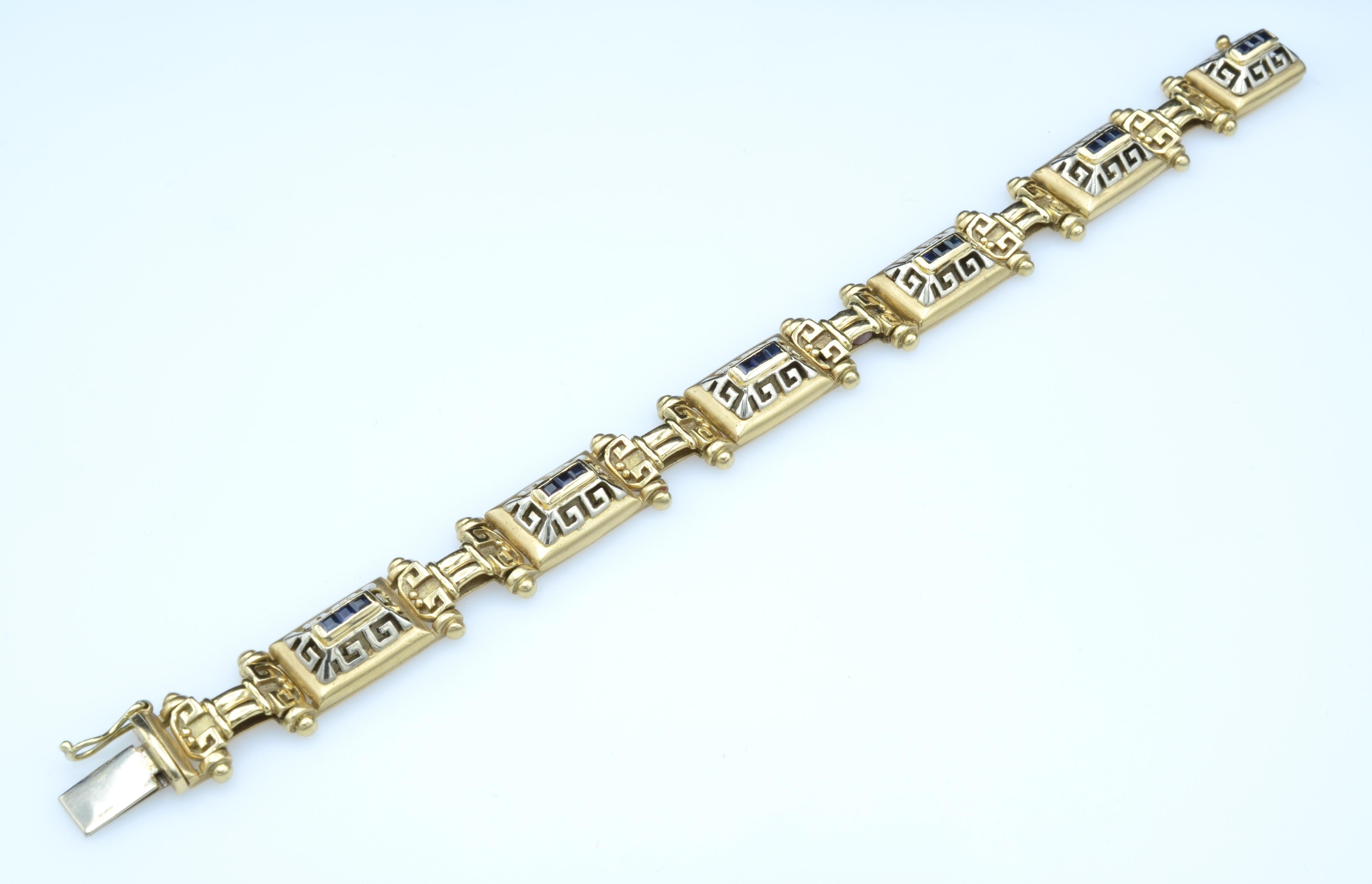 Gold Links 14K Bracelet Roman Design Motifs with Baguette Sapphires In Excellent Condition For Sale In Berkeley, CA